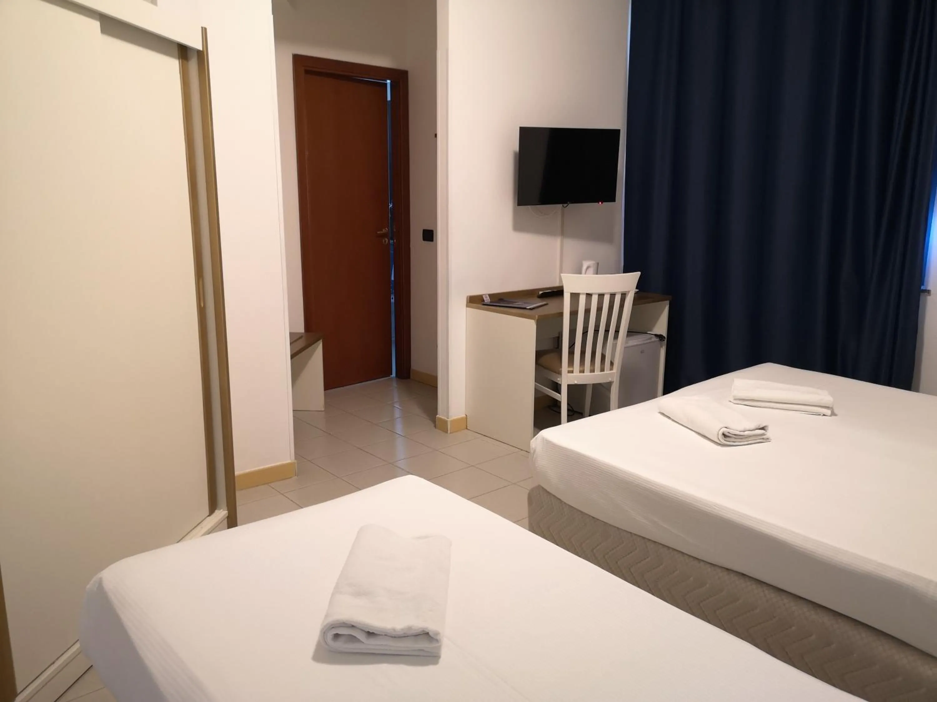 Bed in Oasi Park Hotel