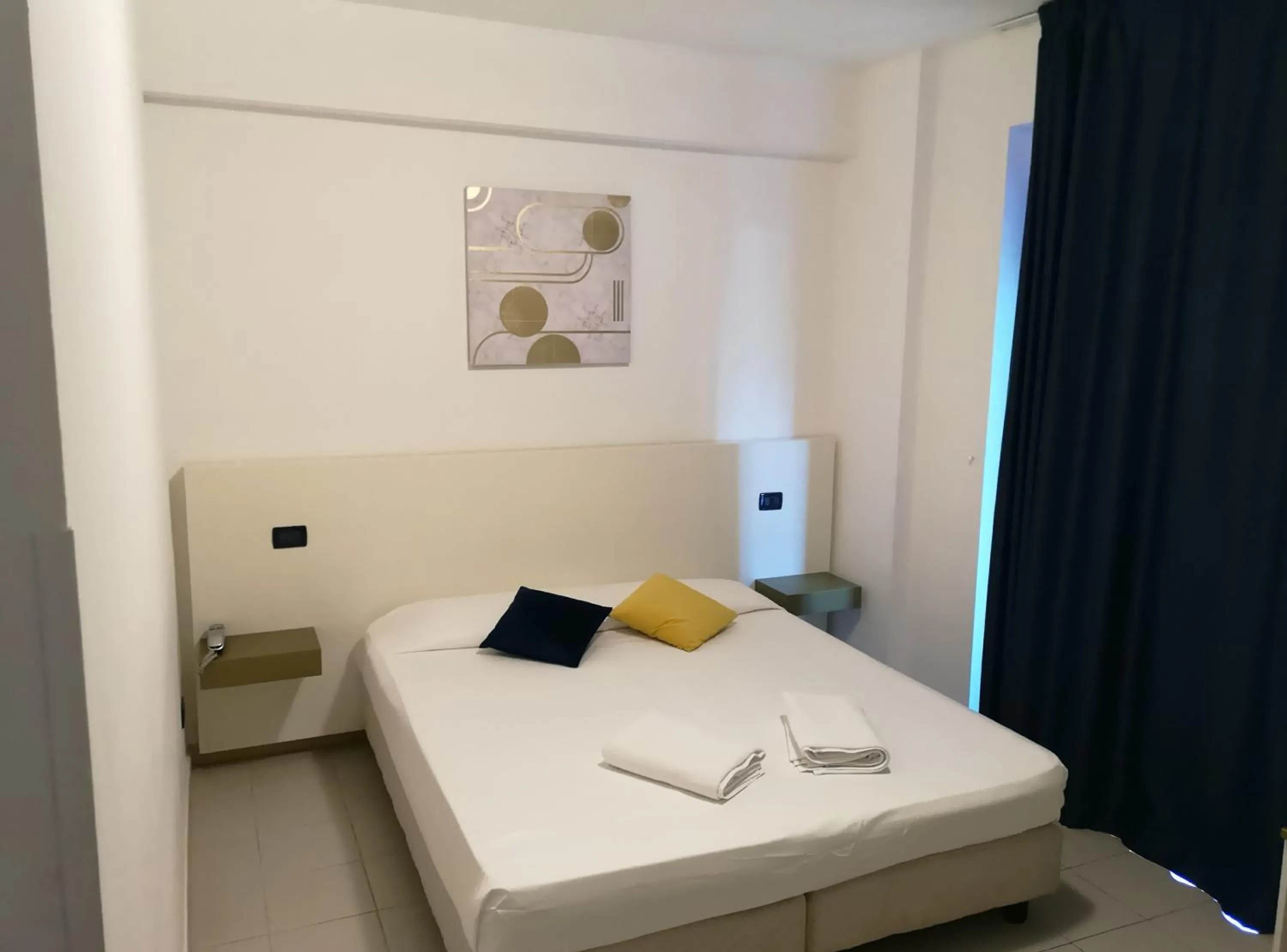 Bed in Oasi Park Hotel