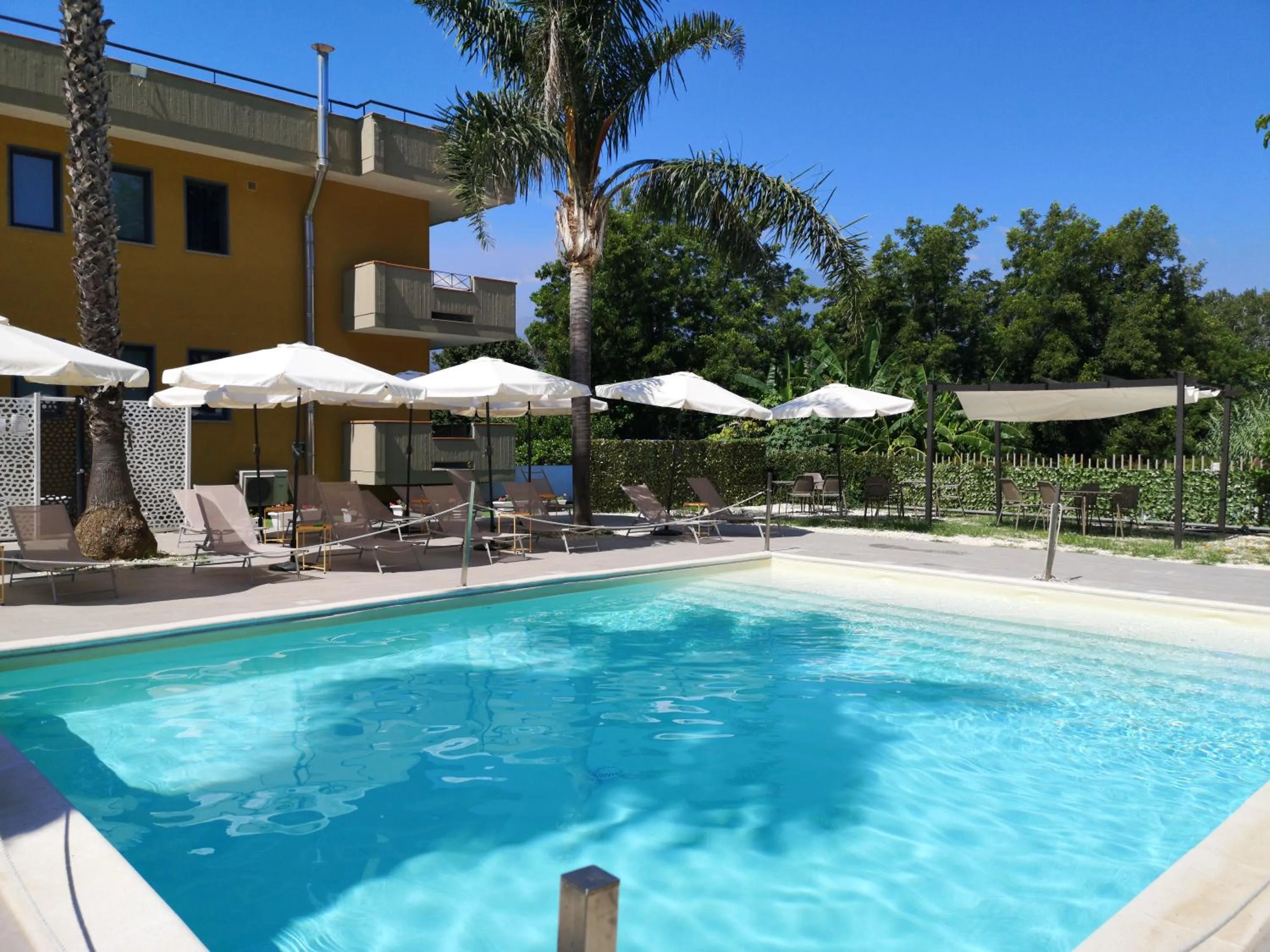 Swimming pool in Oasi Park Hotel