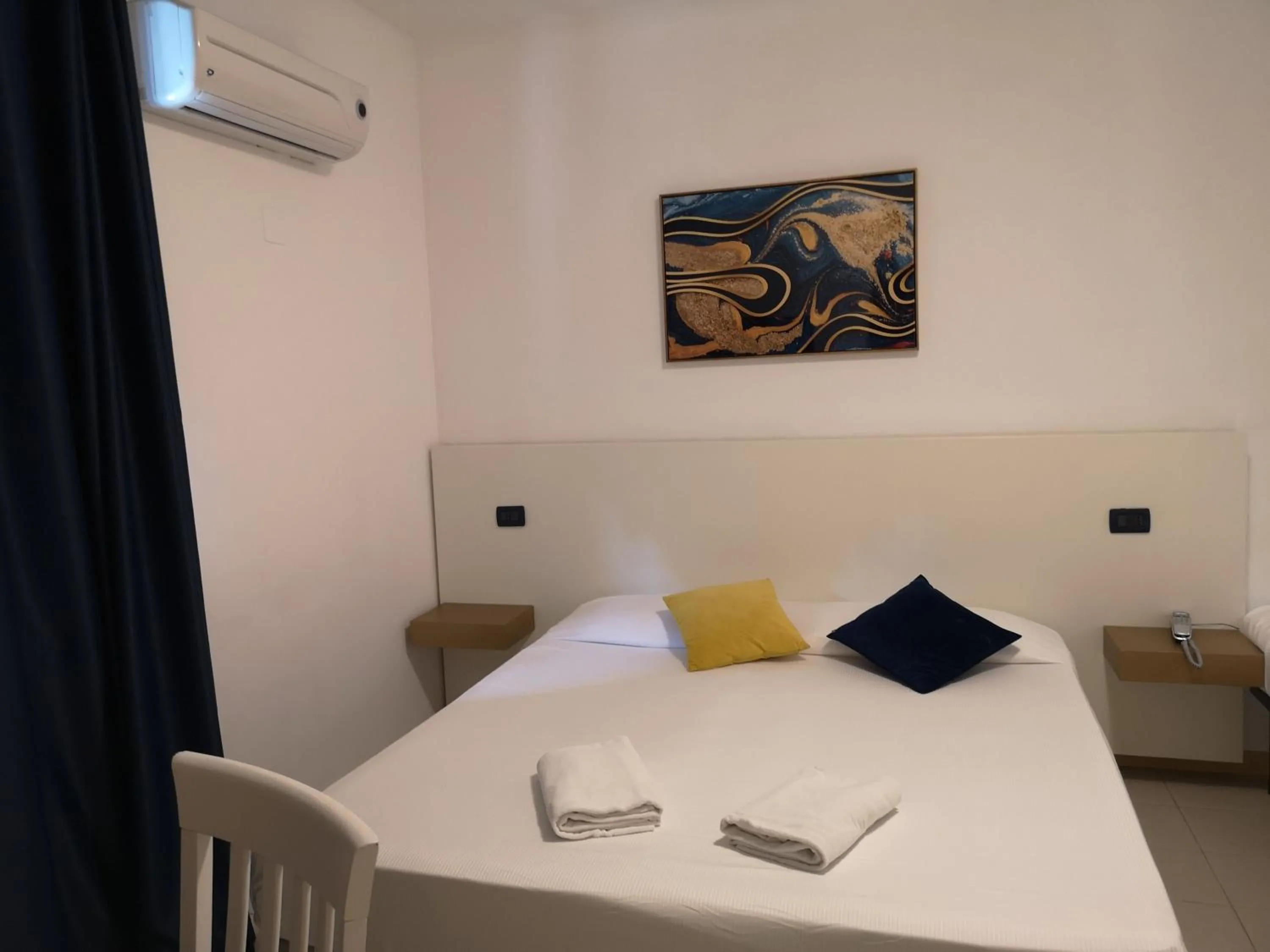 Bed in Oasi Park Hotel