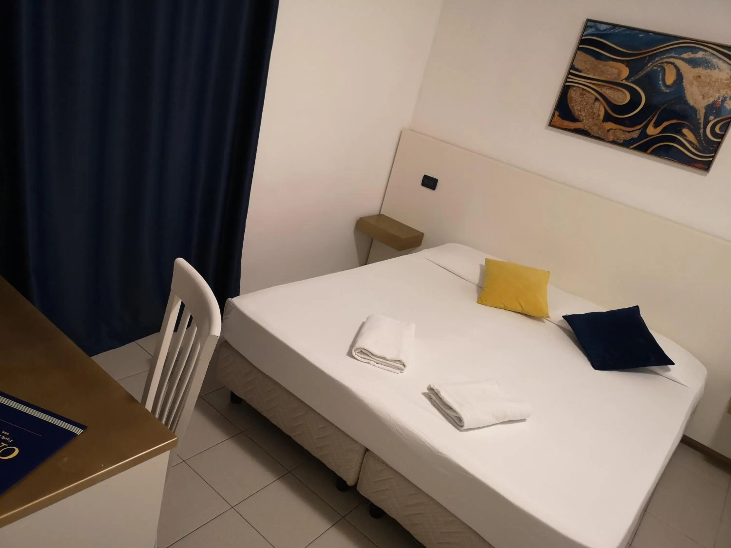 Bed in Oasi Park Hotel