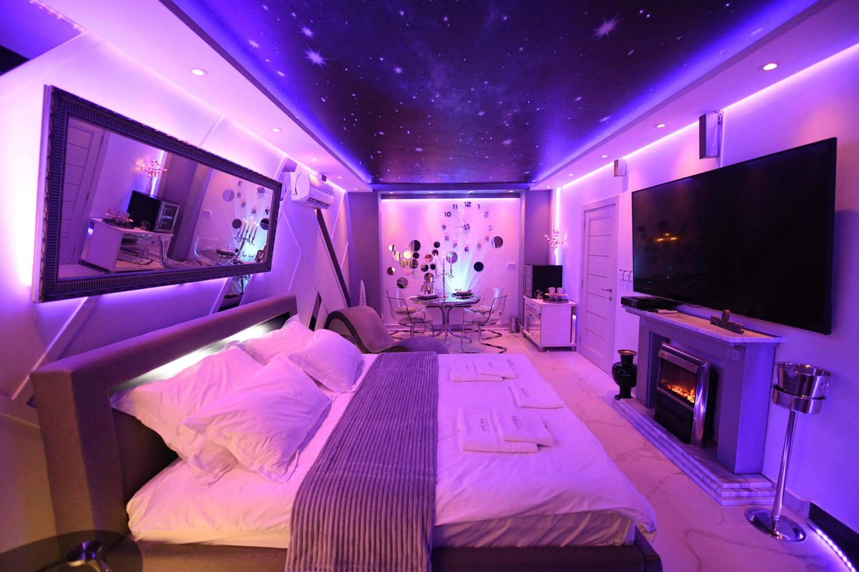 Bed in Aurora Lux Spa Smart apartments