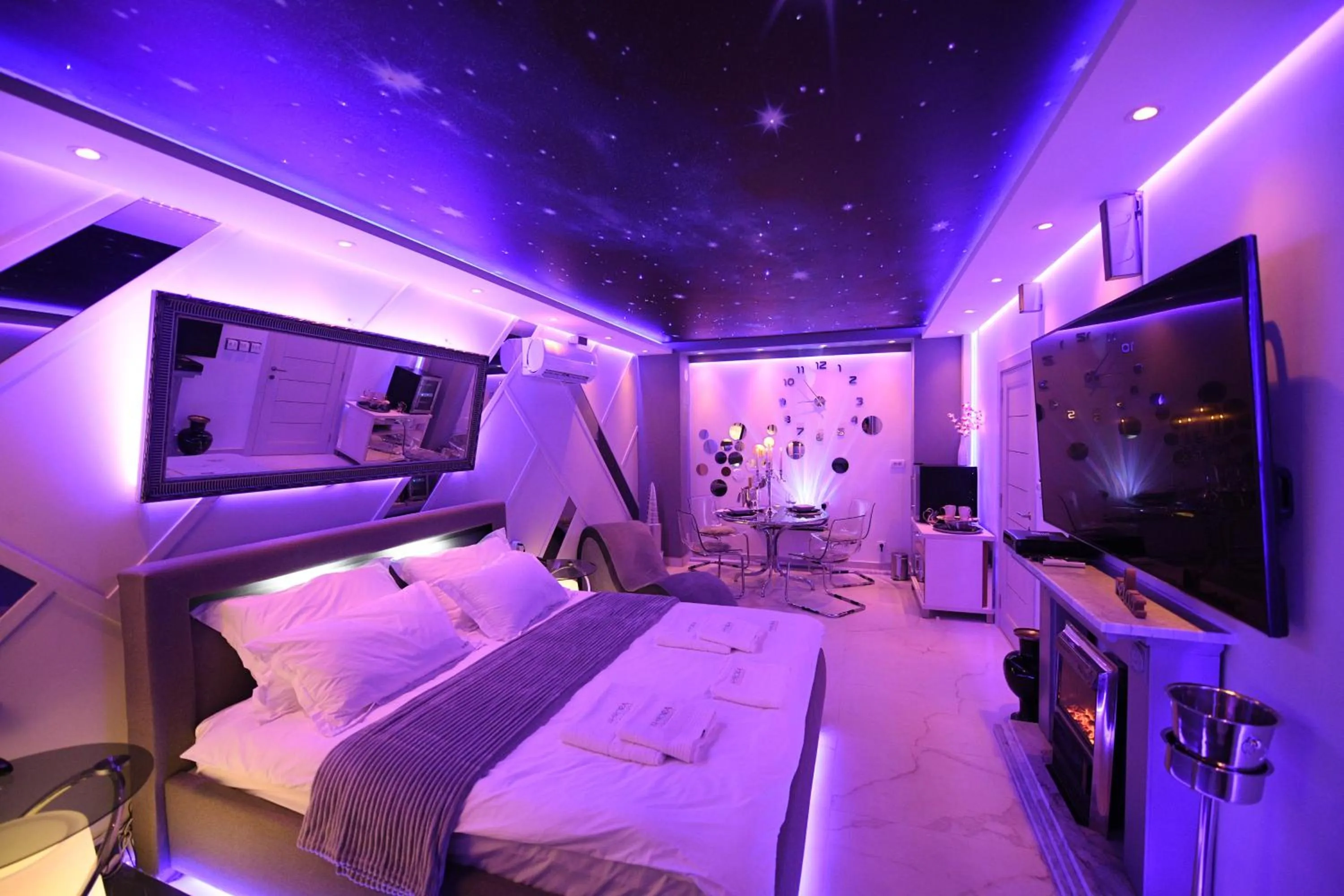 Bed in Aurora Lux Spa Smart apartments