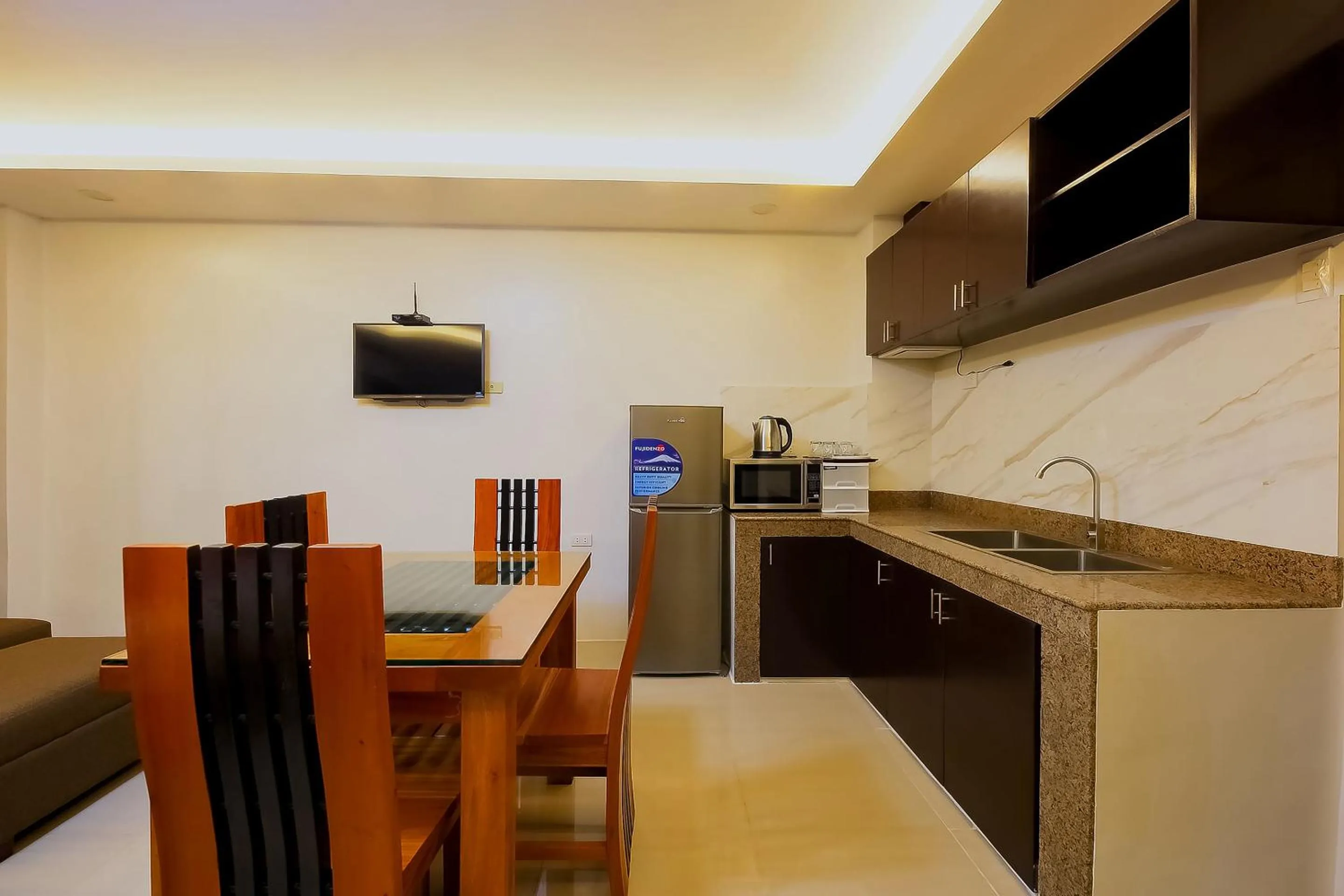 Bedroom in OYO 848 Dona Aurora Condotel