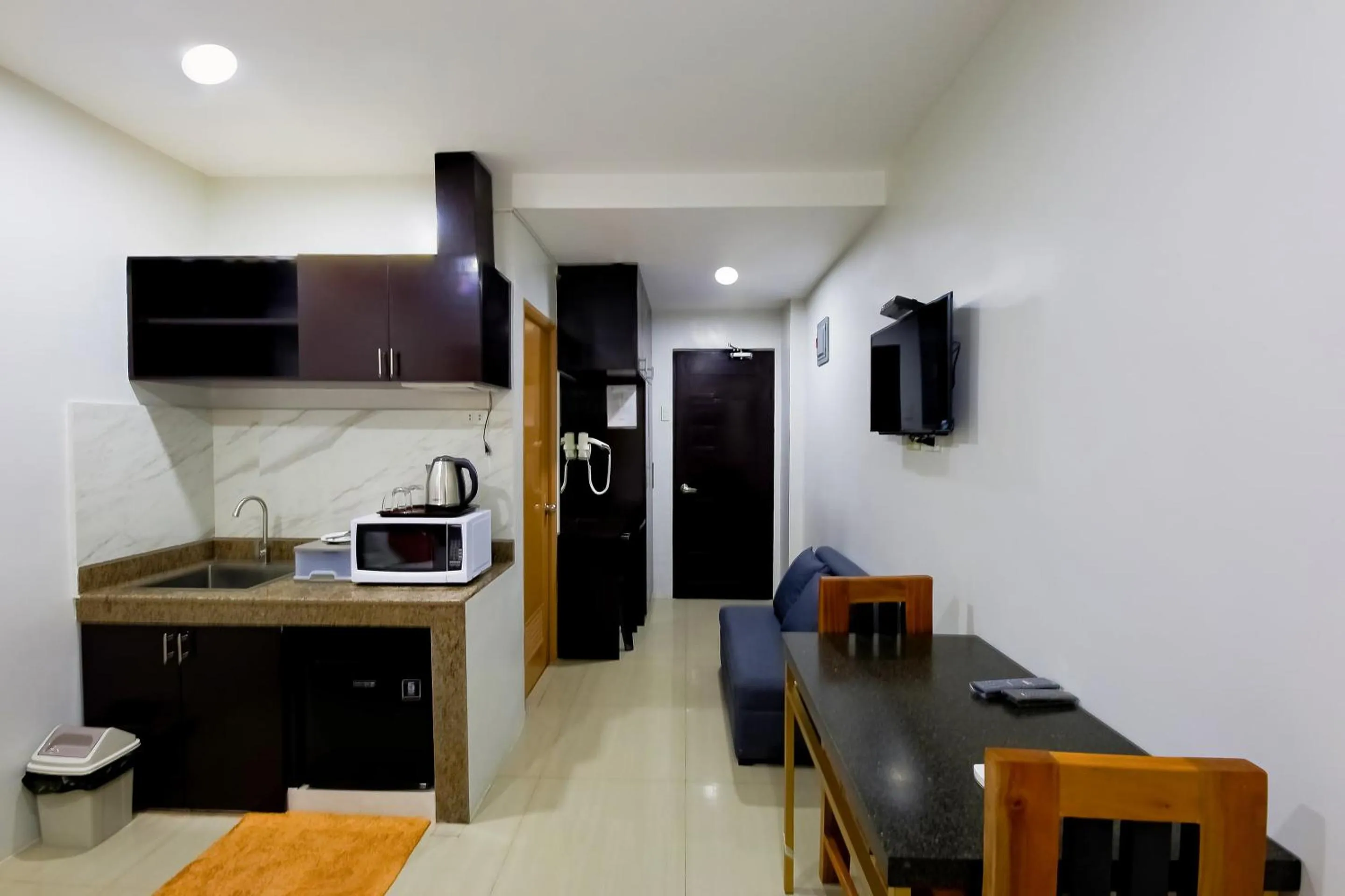 Bedroom in OYO 848 Dona Aurora Condotel