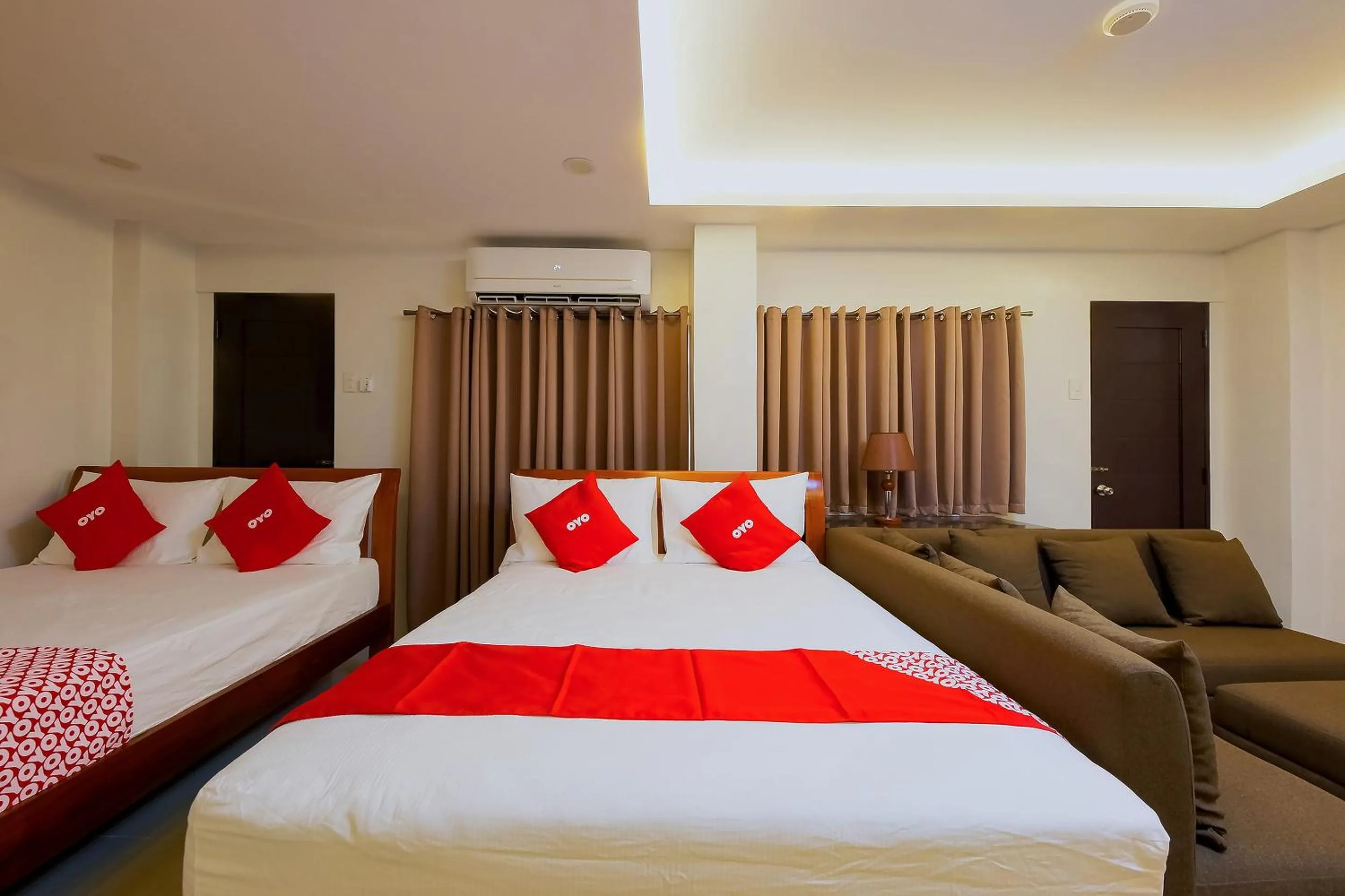 Bedroom in OYO 848 Dona Aurora Condotel