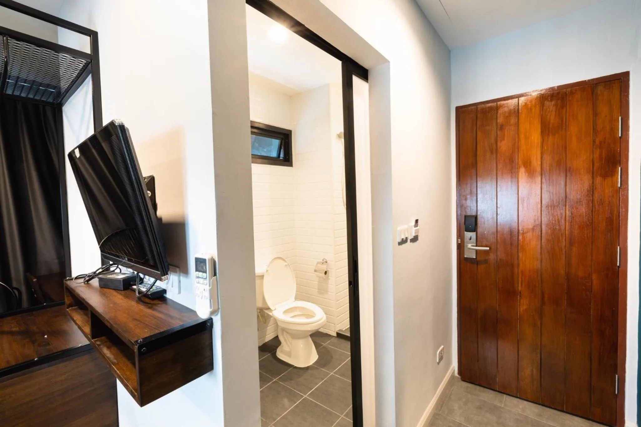 Communal lounge/ TV room in WiRE BANGKOK PRAKHANONG