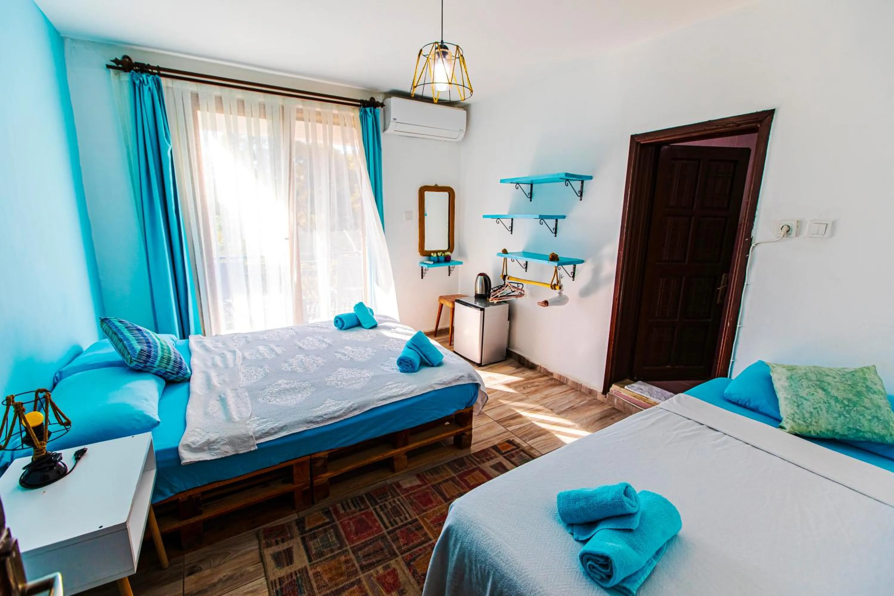 Bed in TUTHALİYA HOTEL