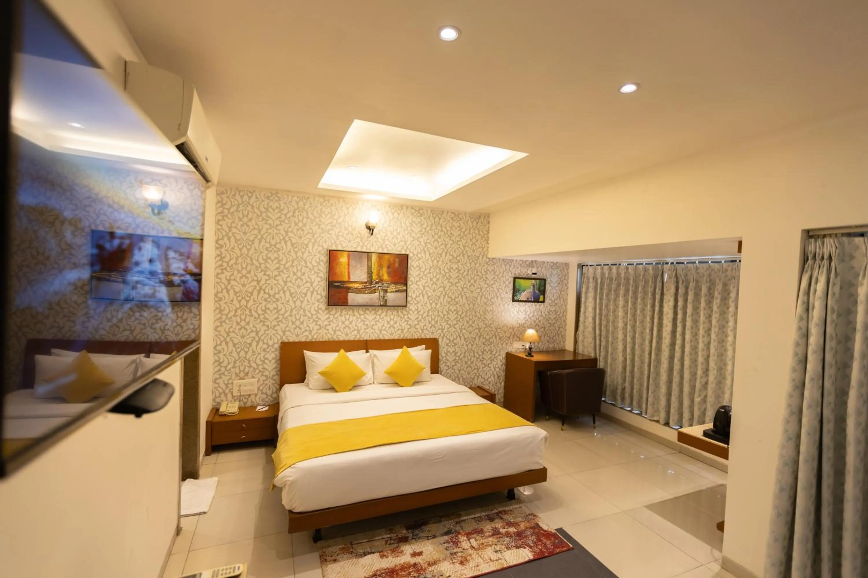 Bedroom, Bed in Pride Biznotel Alkapuri Near Vadodara Airport