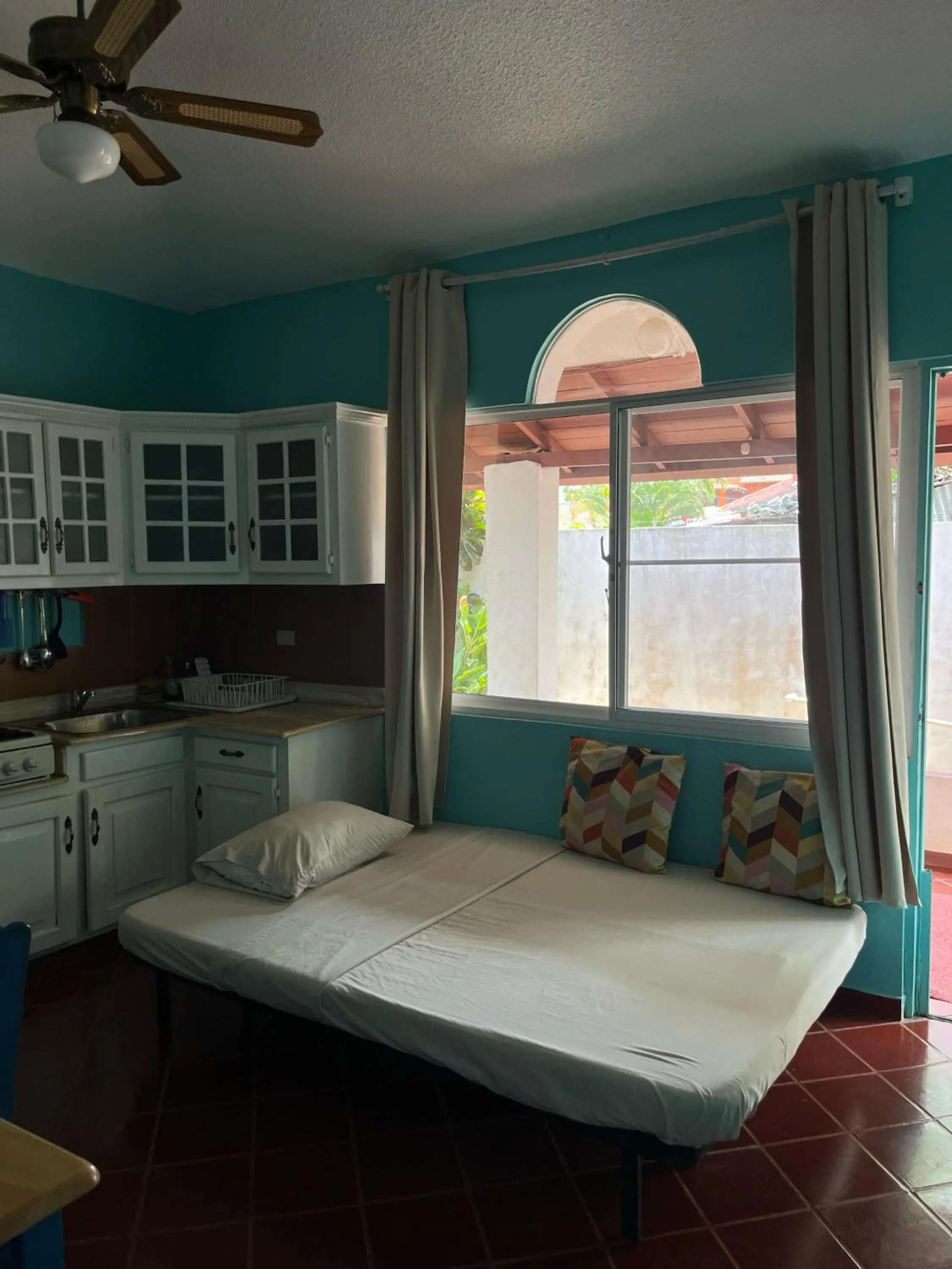 Living room, Bed in PLAYA BLANCA BED AND BREAKFAST