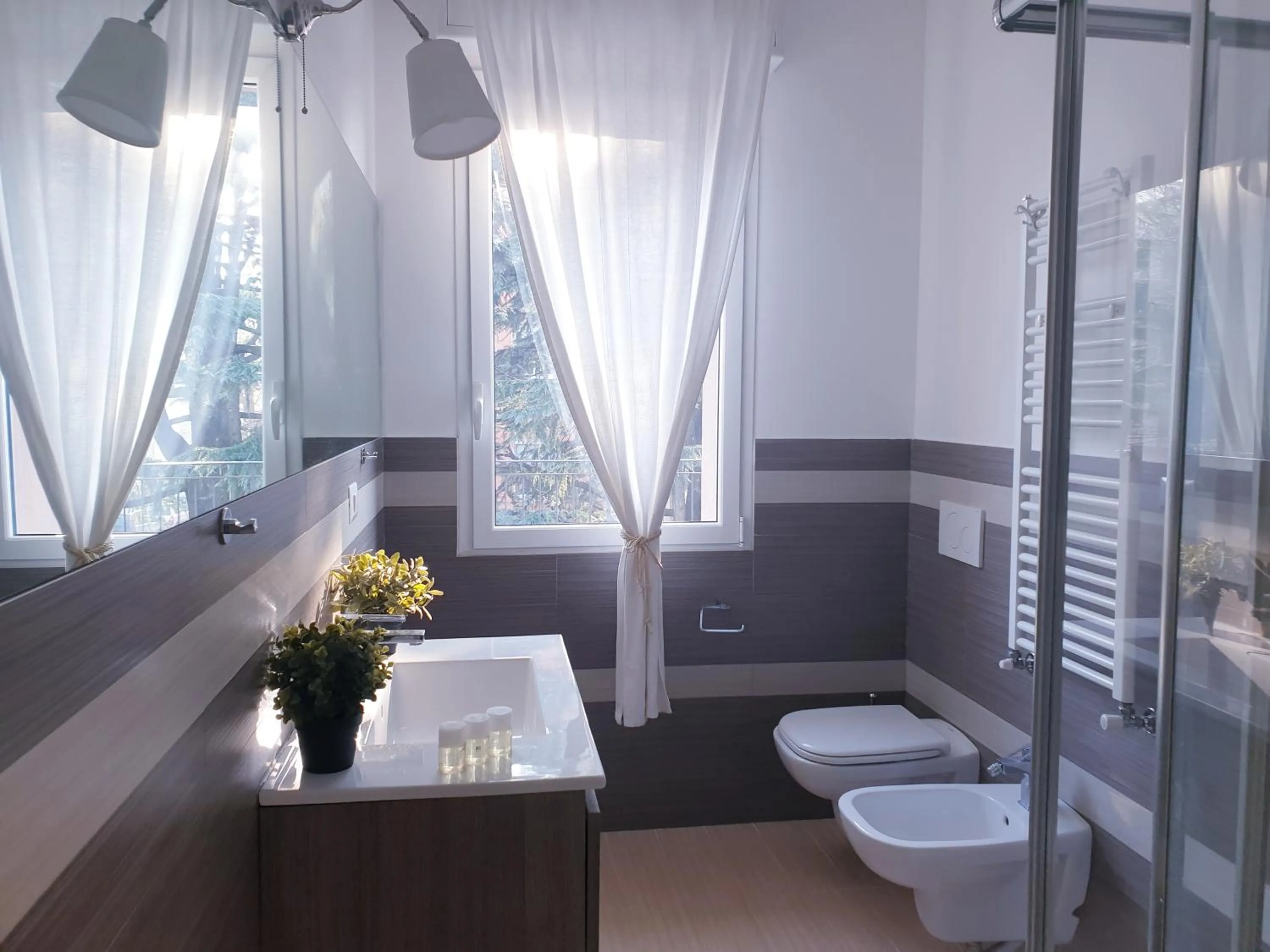 Bathroom in Michelangelo Apartments con parcheggio gratuito in loco e self check in