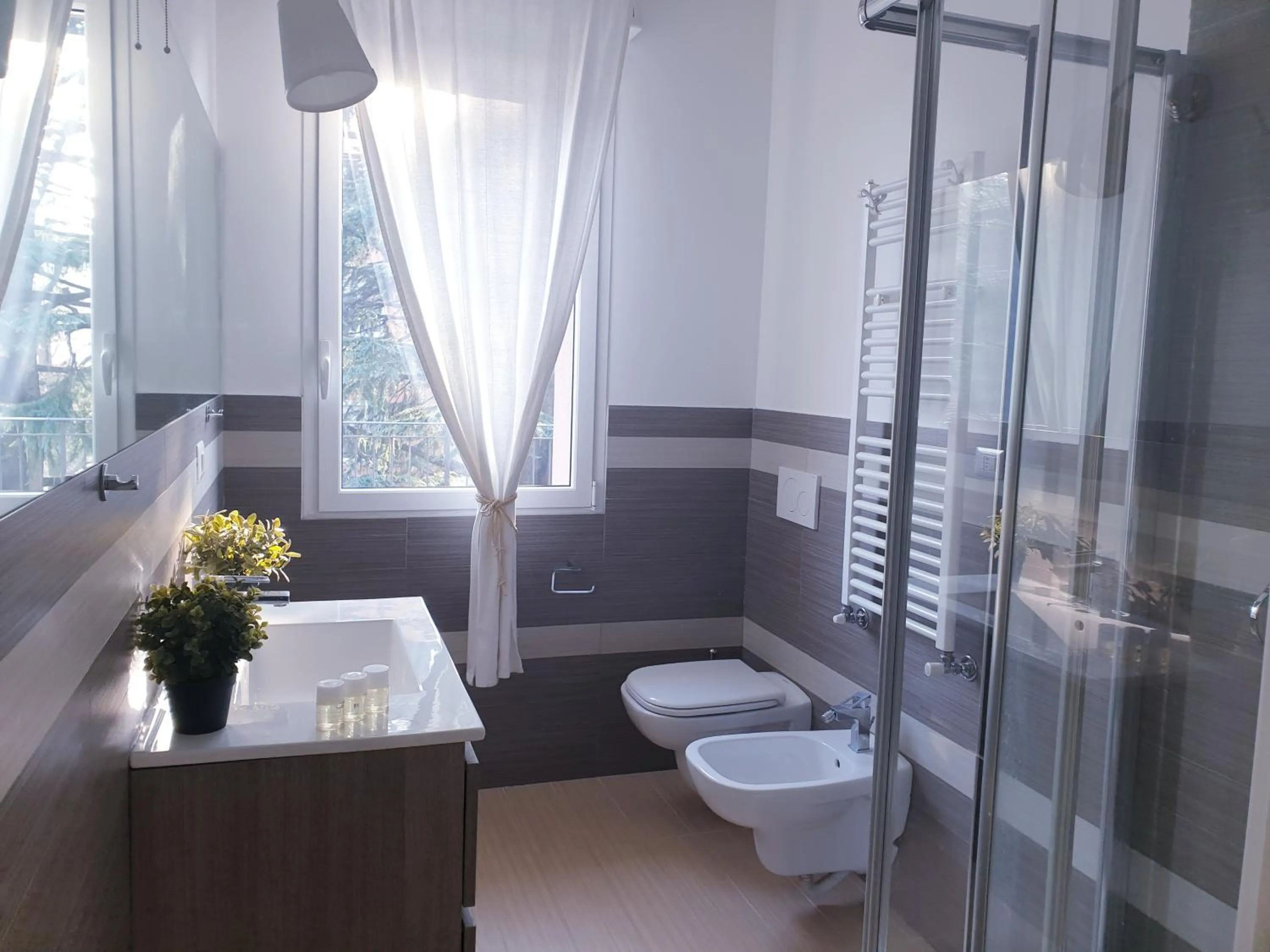 Bathroom in Michelangelo Apartments con parcheggio gratuito in loco e self check in