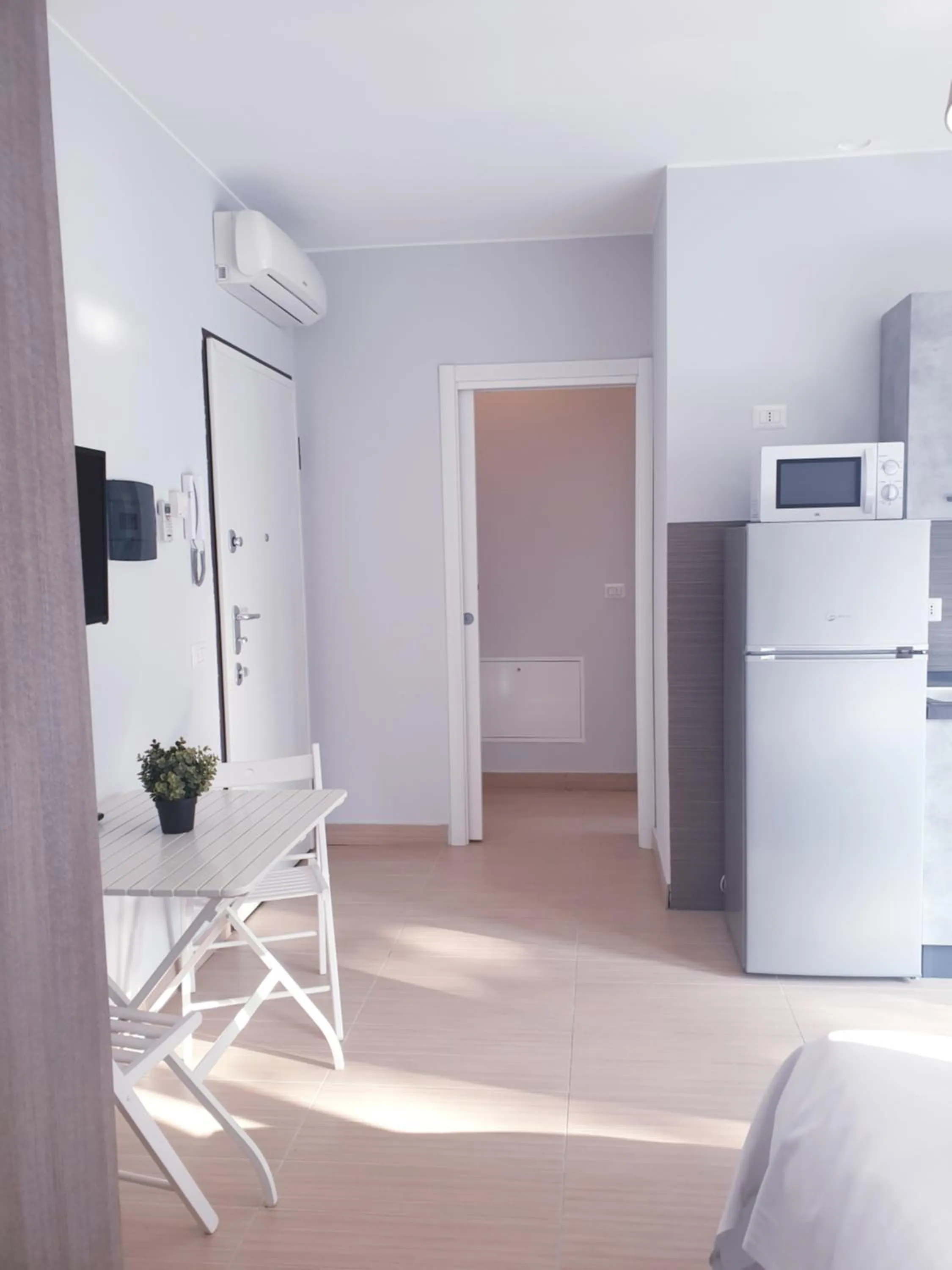 Communal lounge/ TV room in Michelangelo Apartments con parcheggio gratuito in loco e self check in