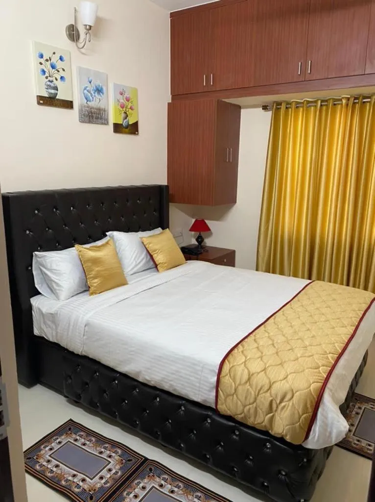 Bed in OM SRINIVASA - TRULY HOMESTAY
