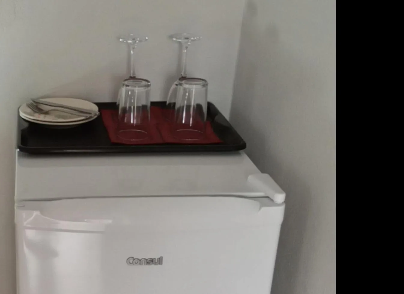 Kitchen or kitchenette in Suíte Ilhinha em condomínio na Praia do Perequê