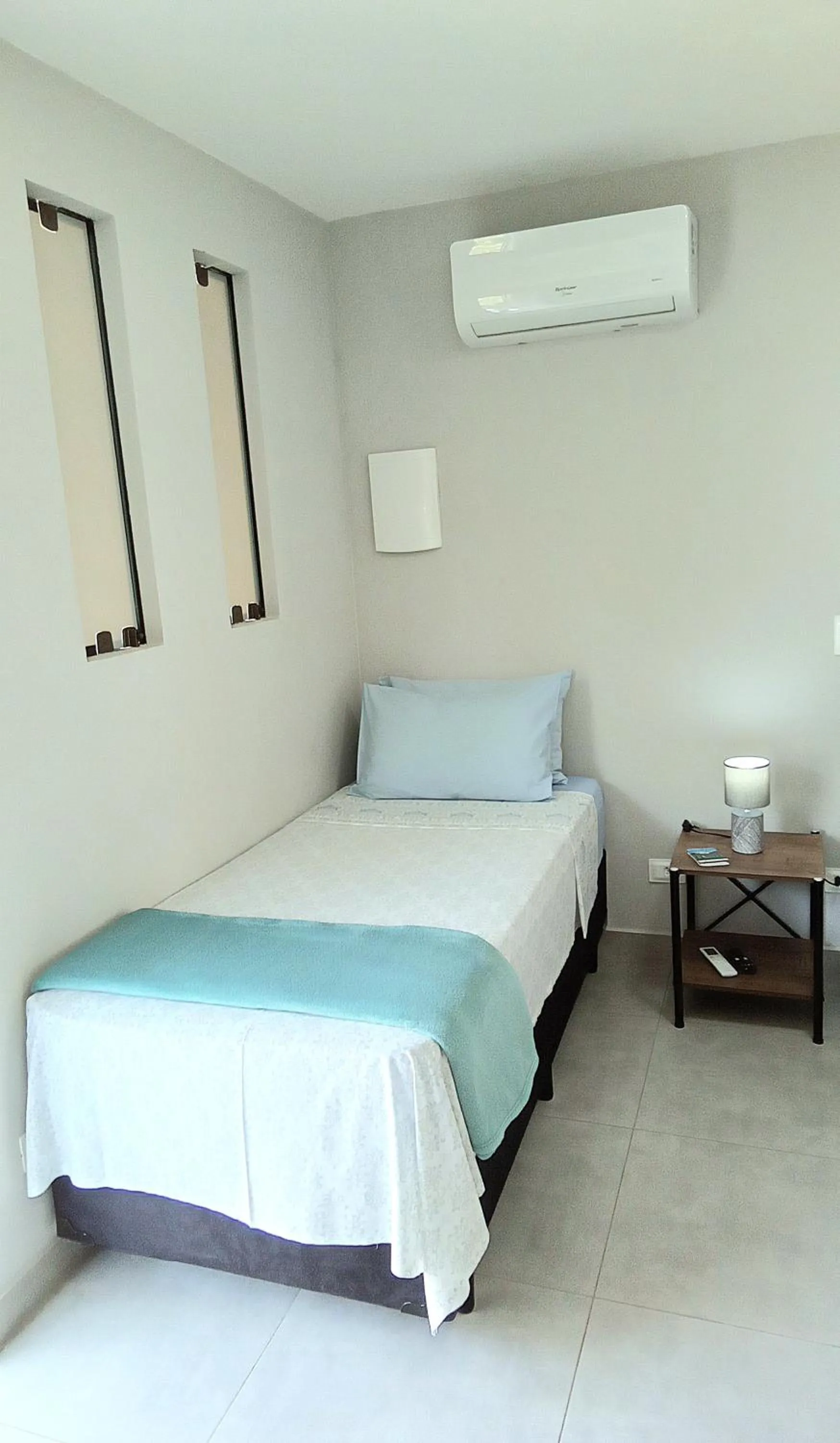 Bed in Suíte Ilhinha em condomínio na Praia do Perequê