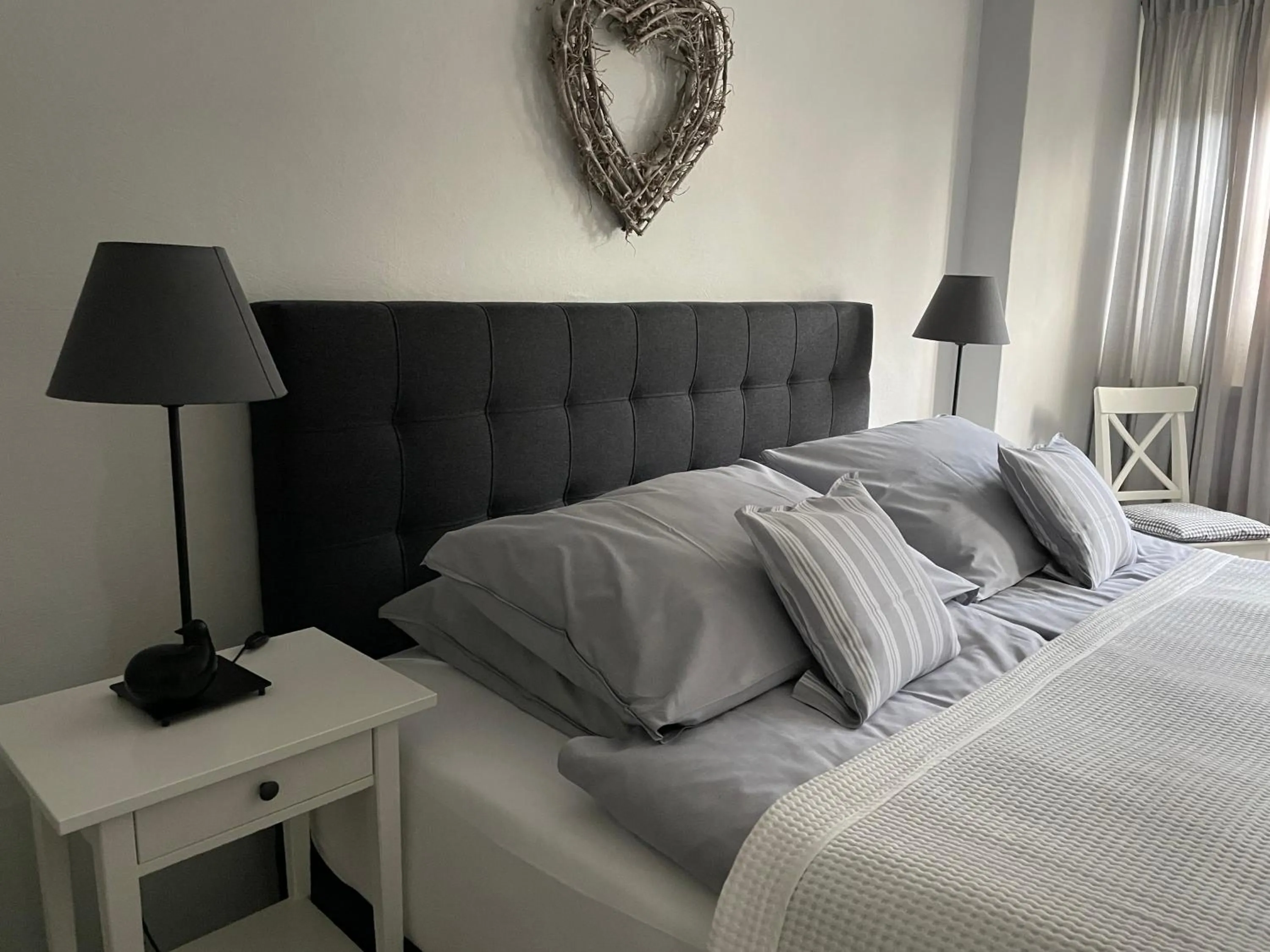 Bedroom, Bed in Friesen-Lodge Ferienwohnungen