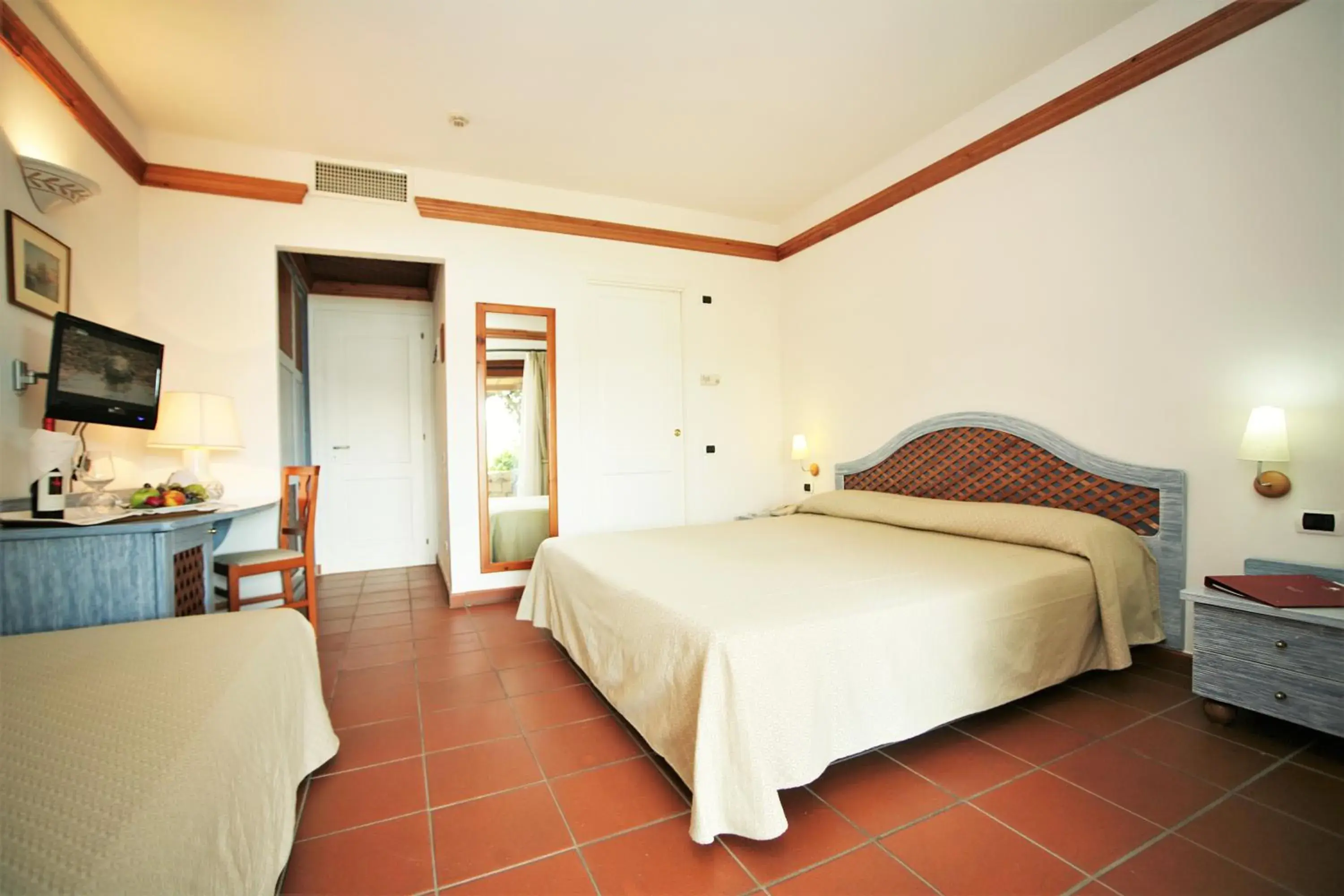 Classic Triple Room with Garden View in Hotel Palumbalza Porto Rotondo Classic Triple Room with Garden View in Hotel Palumbalza Porto Rotondo