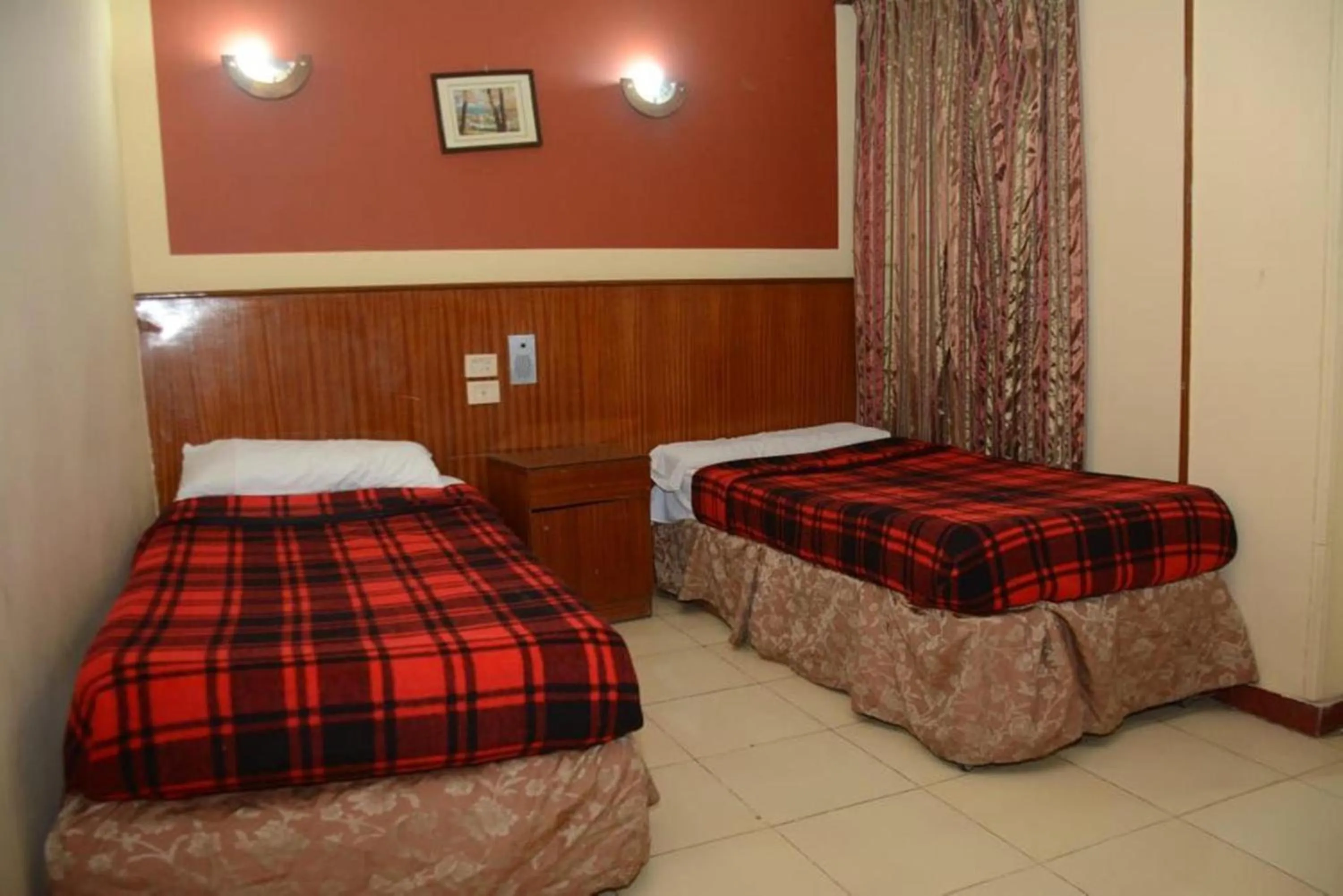 Bed in New Saint Catherine Hotel