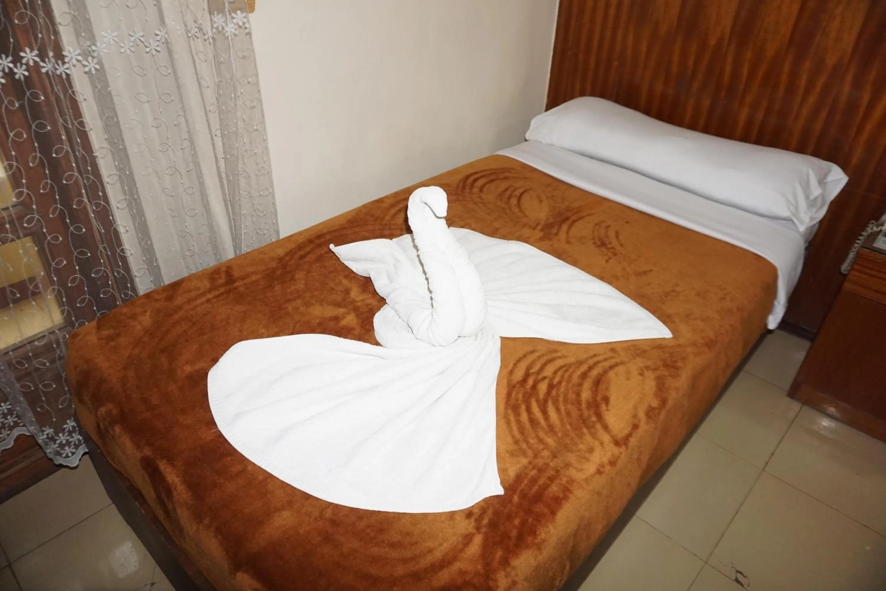 Bed in New Saint Catherine Hotel