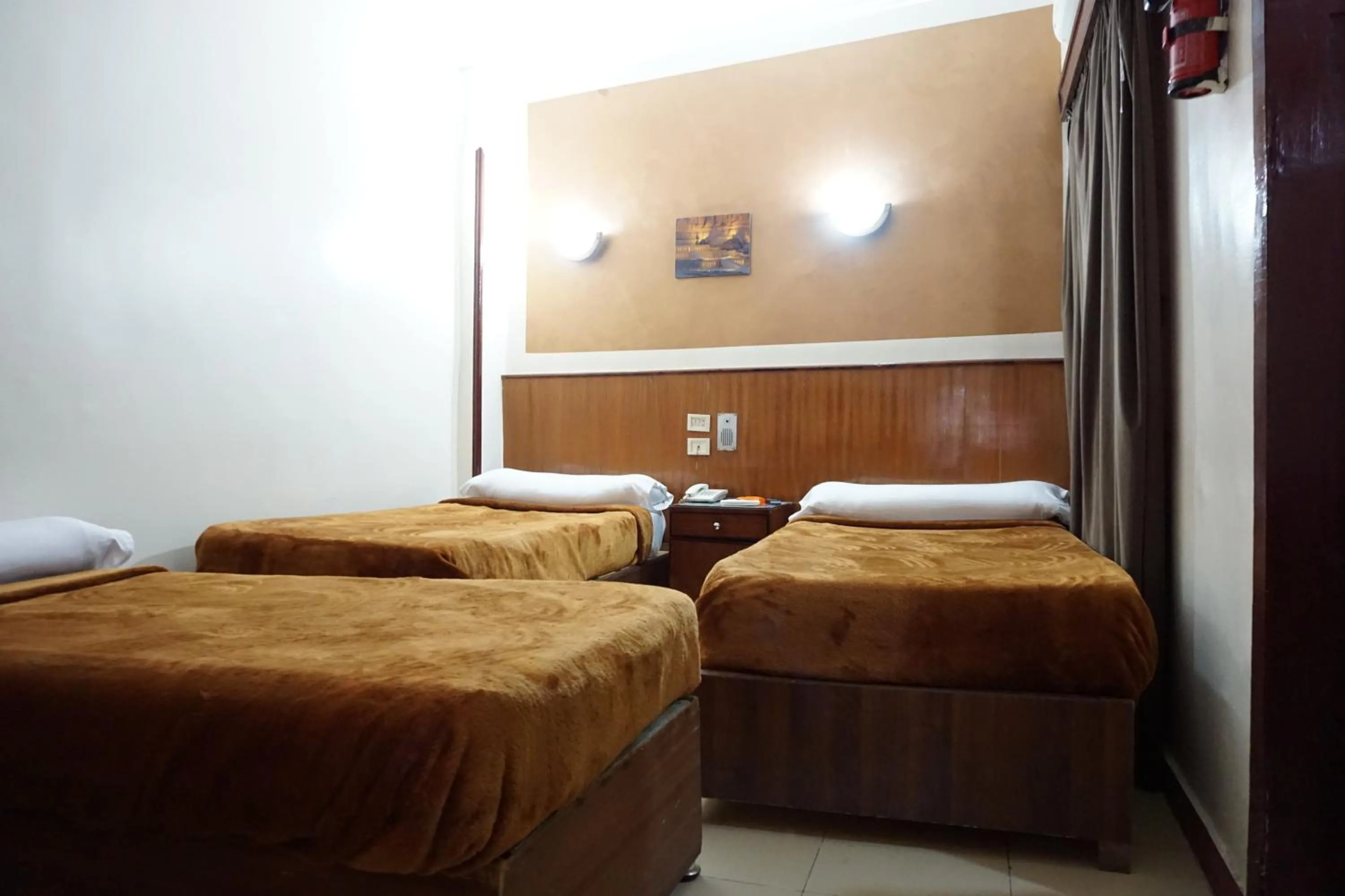 Bed in New Saint Catherine Hotel