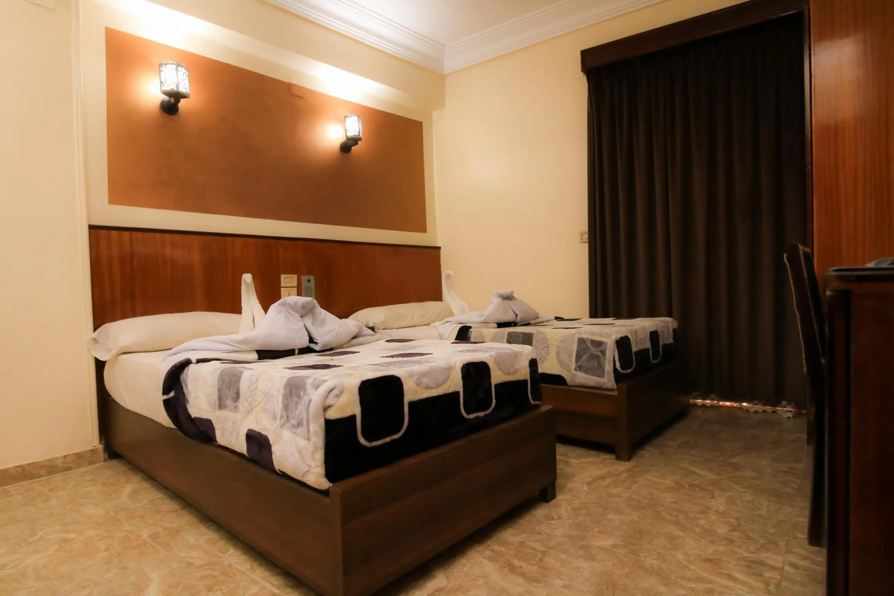 Photo of the whole room, Bed in New Saint Catherine Hotel