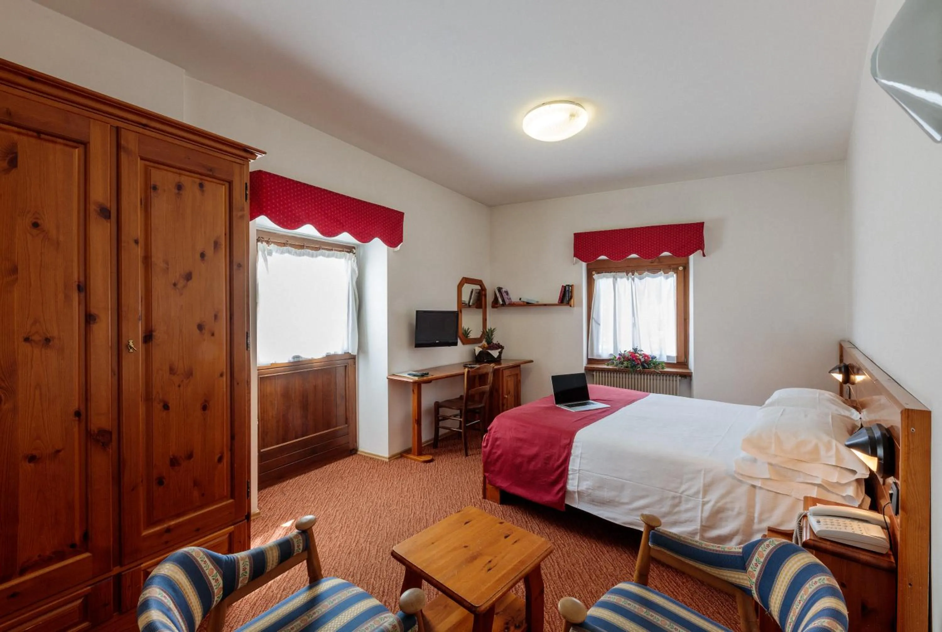 Bed in Hotel Miramonti Corvara