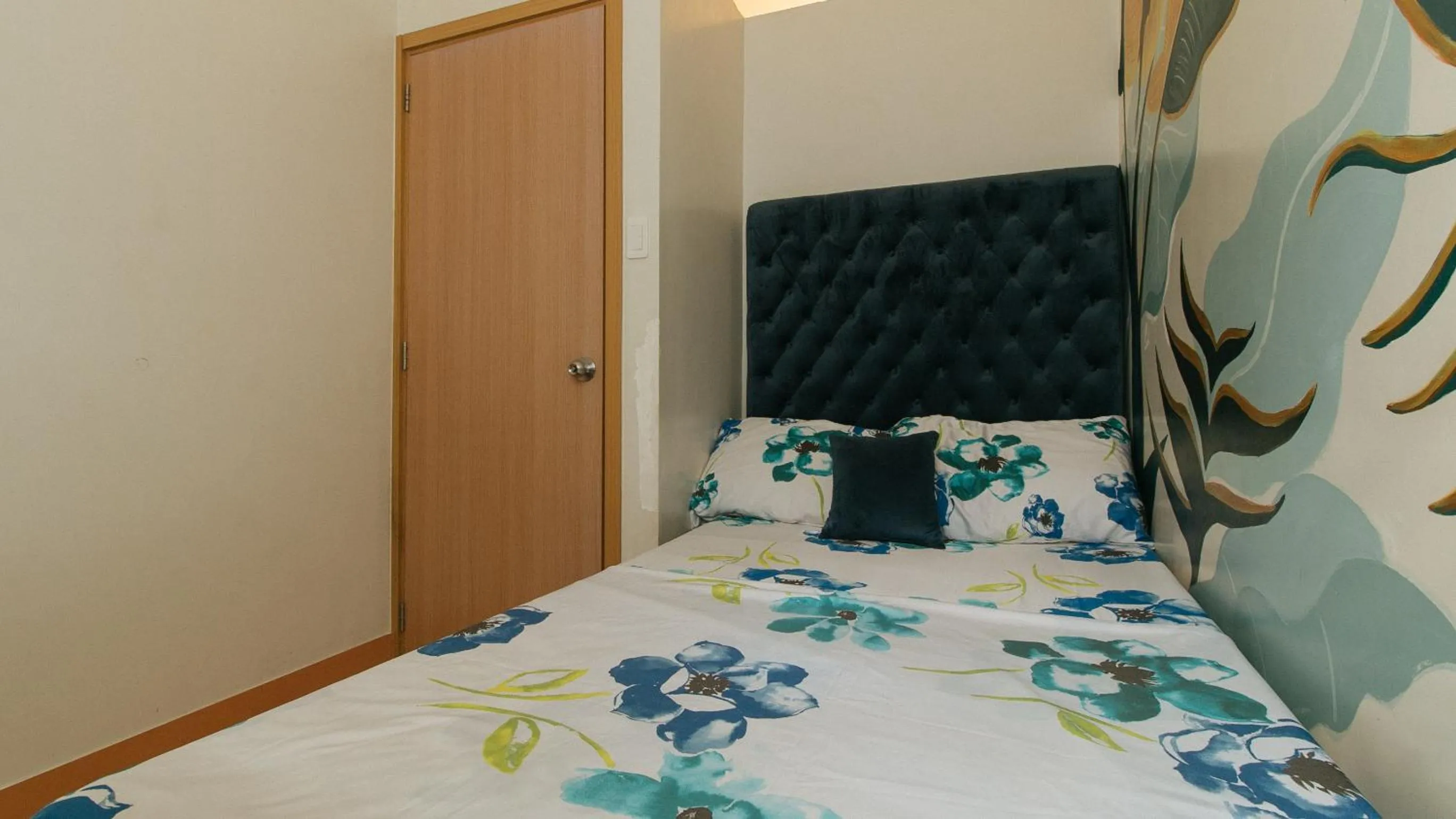 Bed in Jamah's Staycation at SMDC Trees Residences by RedDoorz