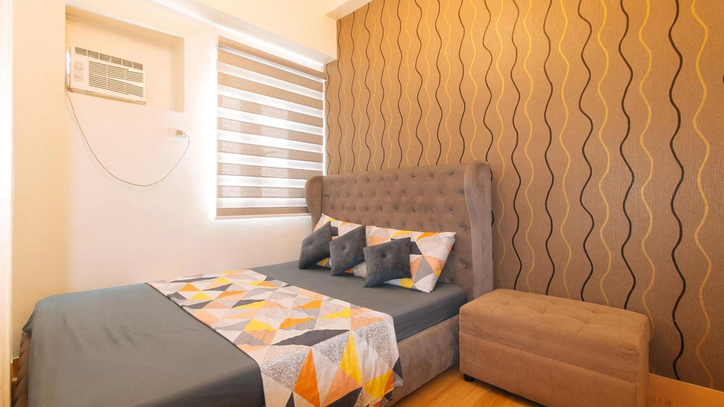 Bedroom in Jamah's Staycation at SMDC Trees Residences by RedDoorz