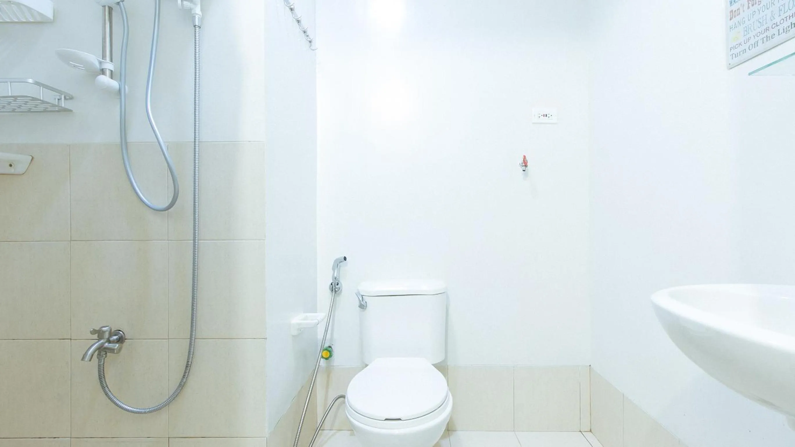 Shower in Jamah's Staycation at SMDC Trees Residences by RedDoorz