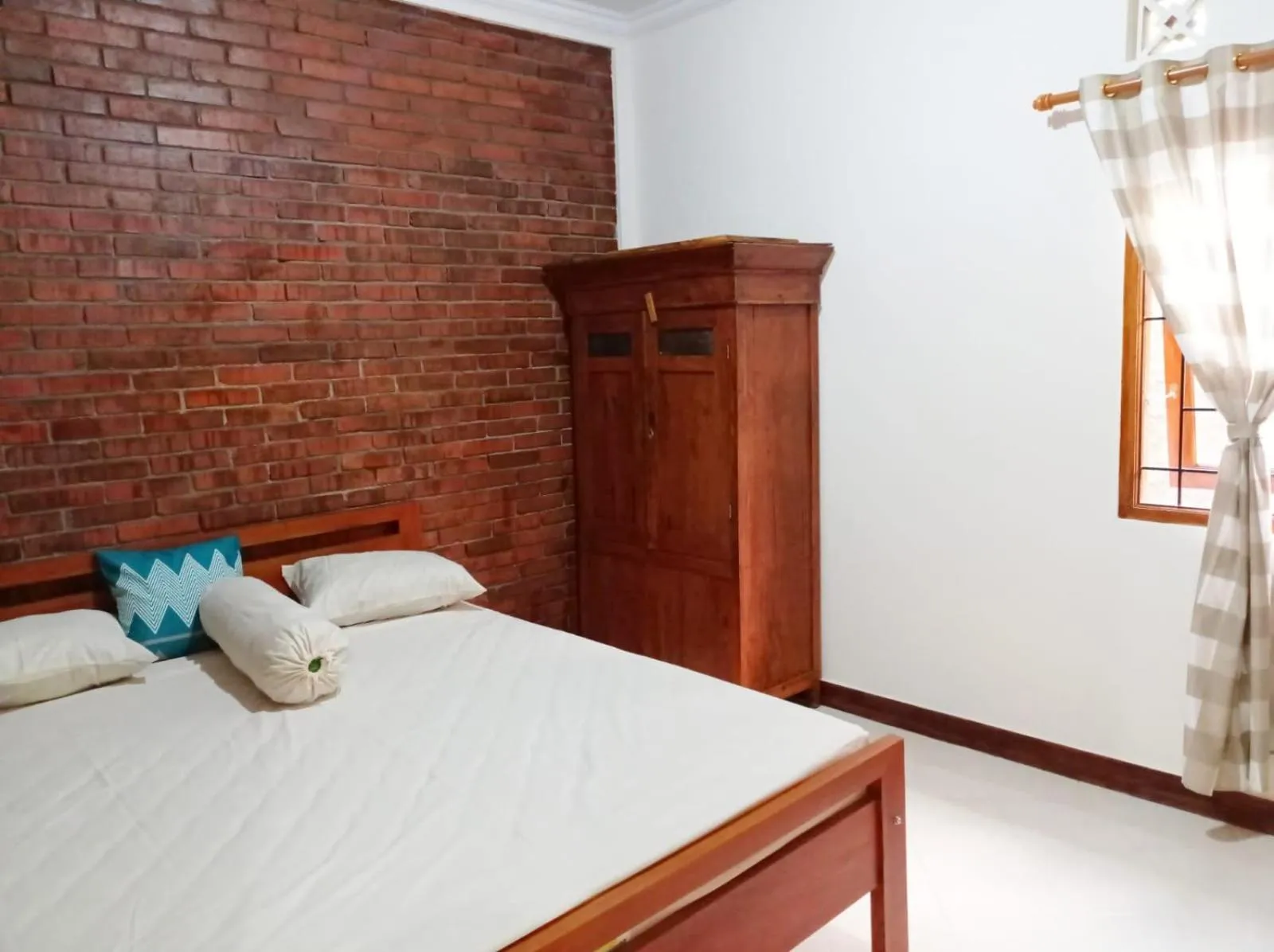 Bed in Angler Homestay & Joglo