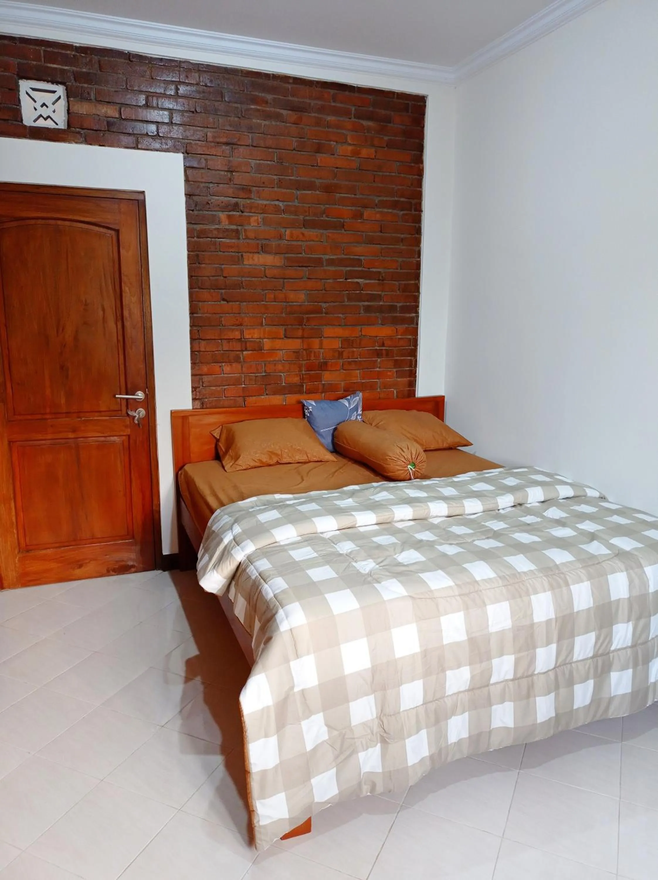Bed in Angler Homestay & Joglo