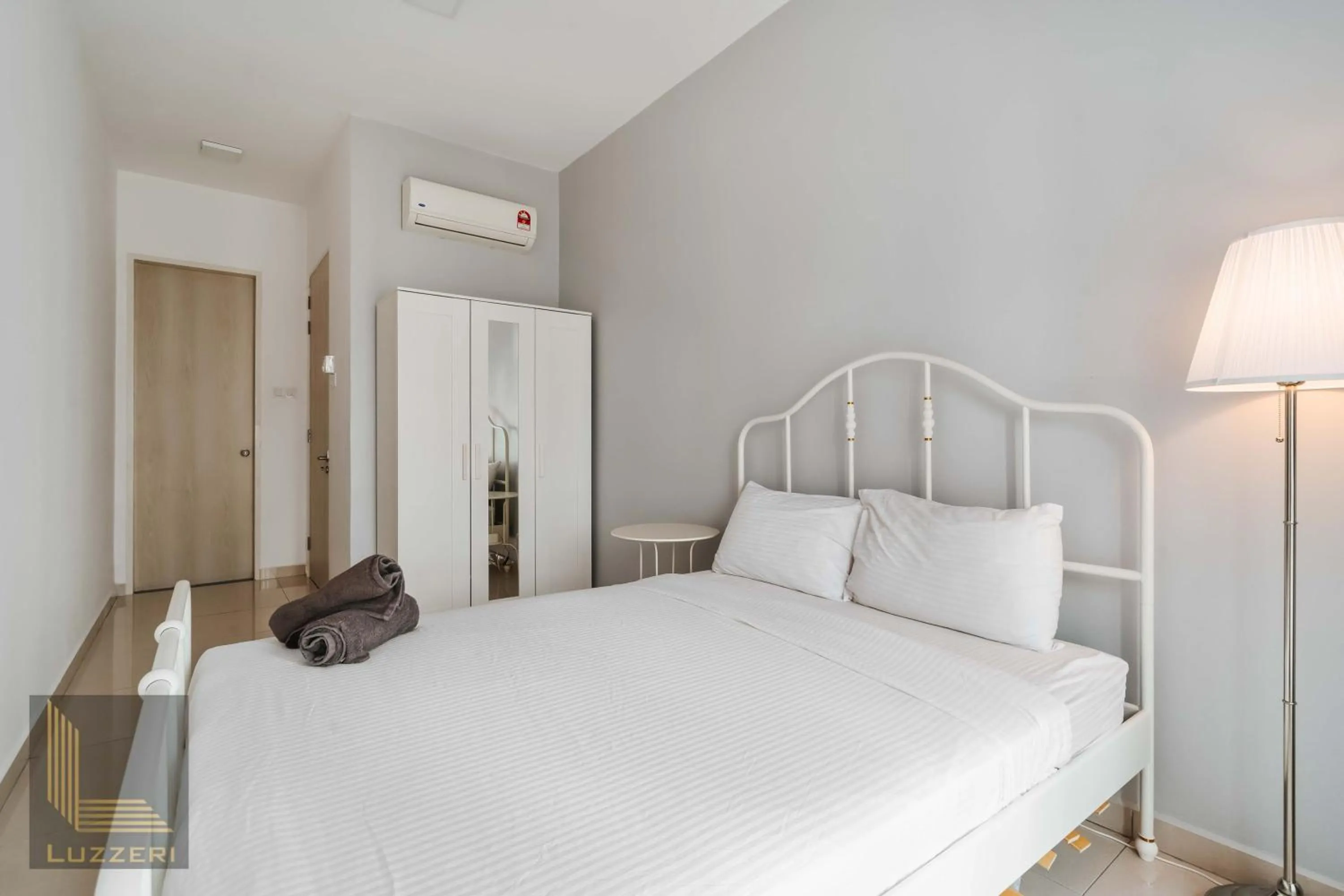 Bed in Legasi Kampung Baru Guesthouse