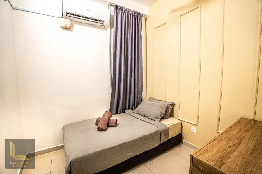 Bed in Legasi Kampung Baru Guesthouse