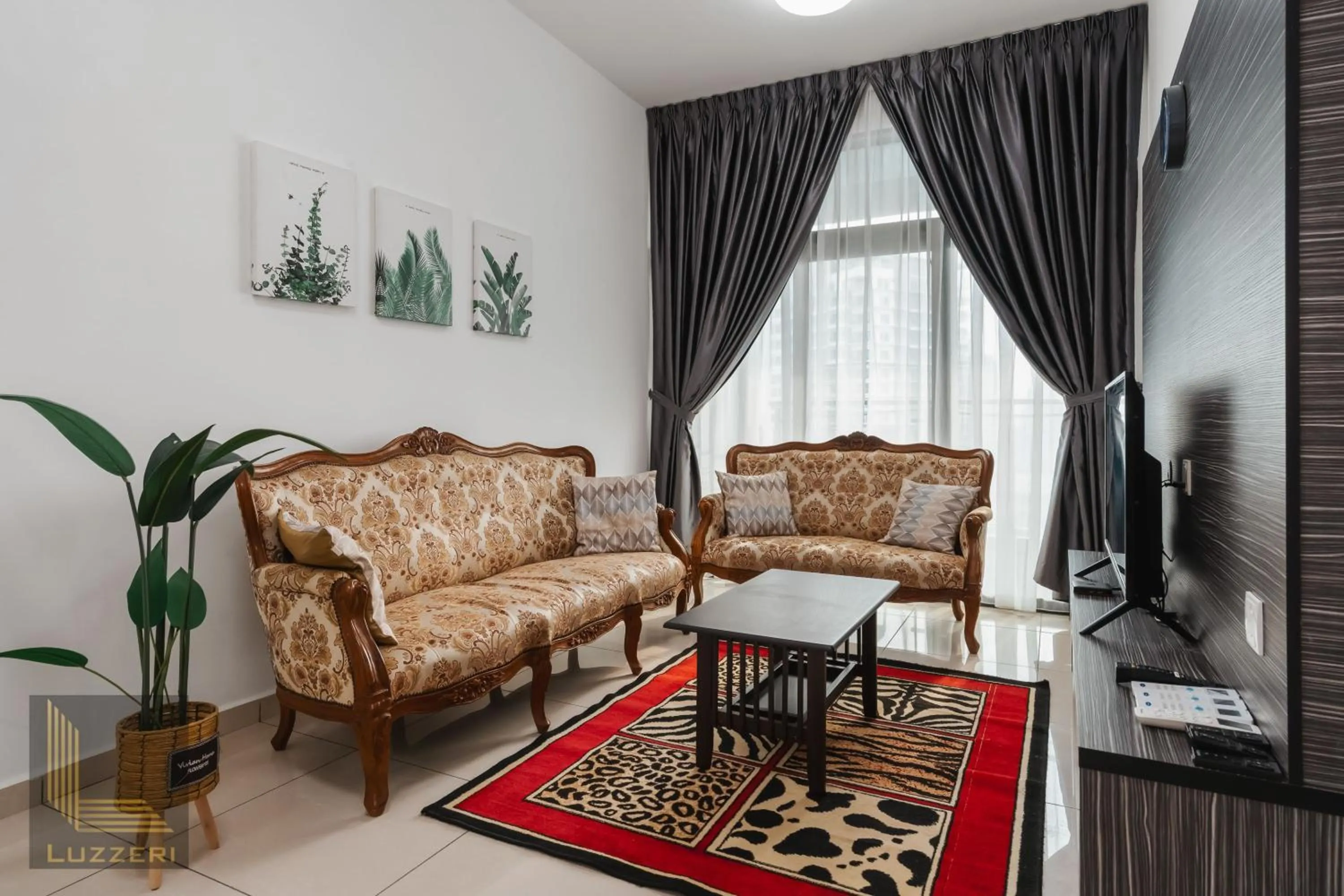 Living room in Legasi Kampung Baru Guesthouse