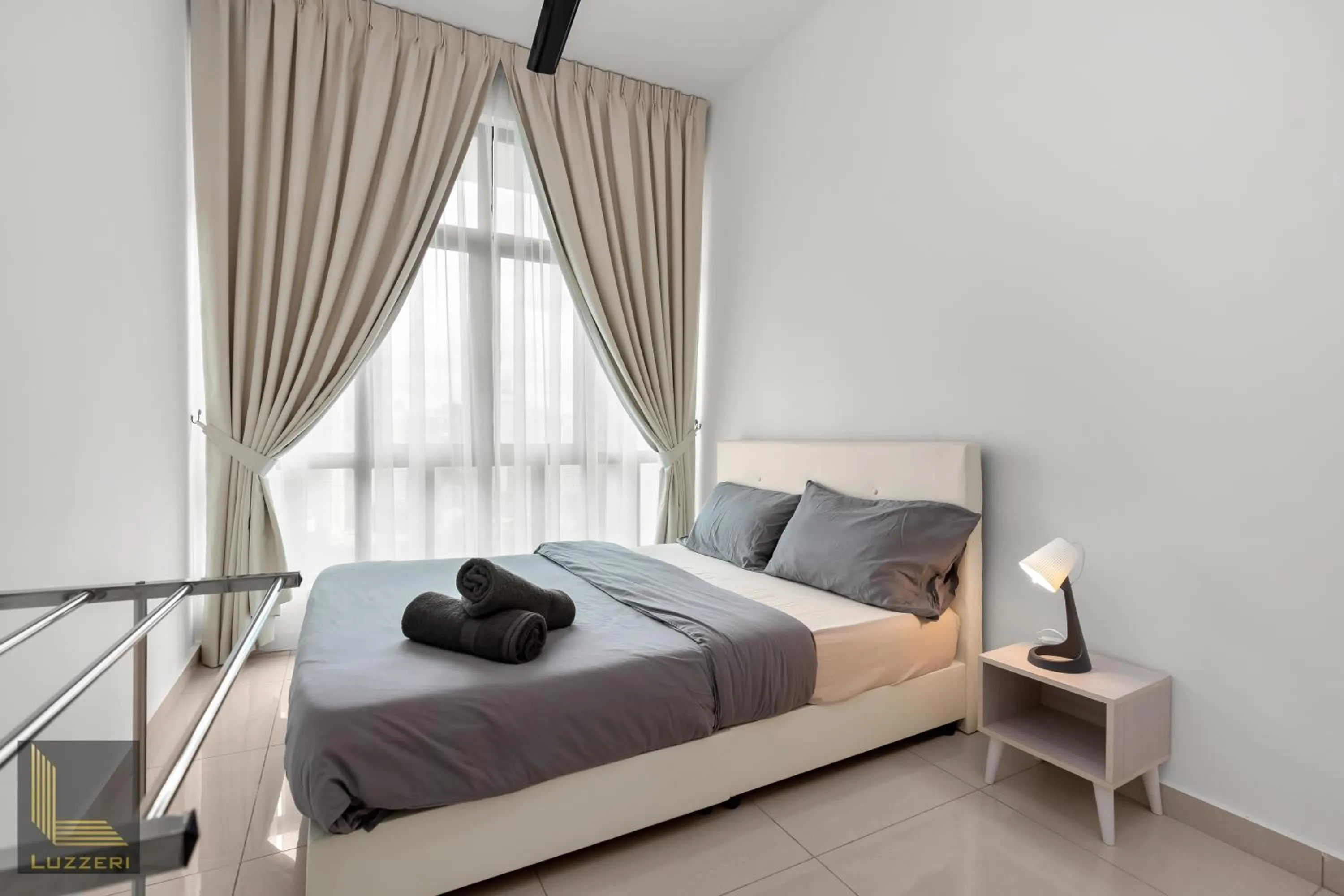 Bed in Legasi Kampung Baru Guesthouse