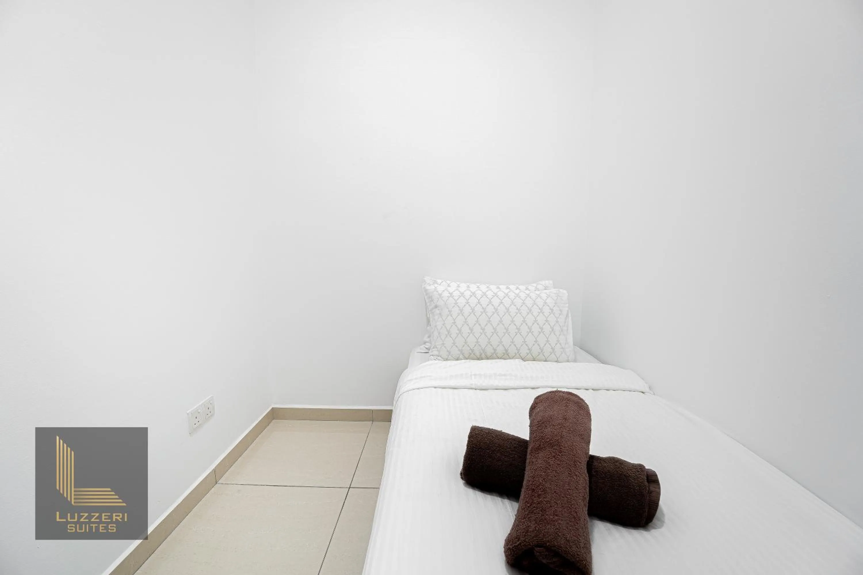 Bed in Legasi Kampung Baru Guesthouse