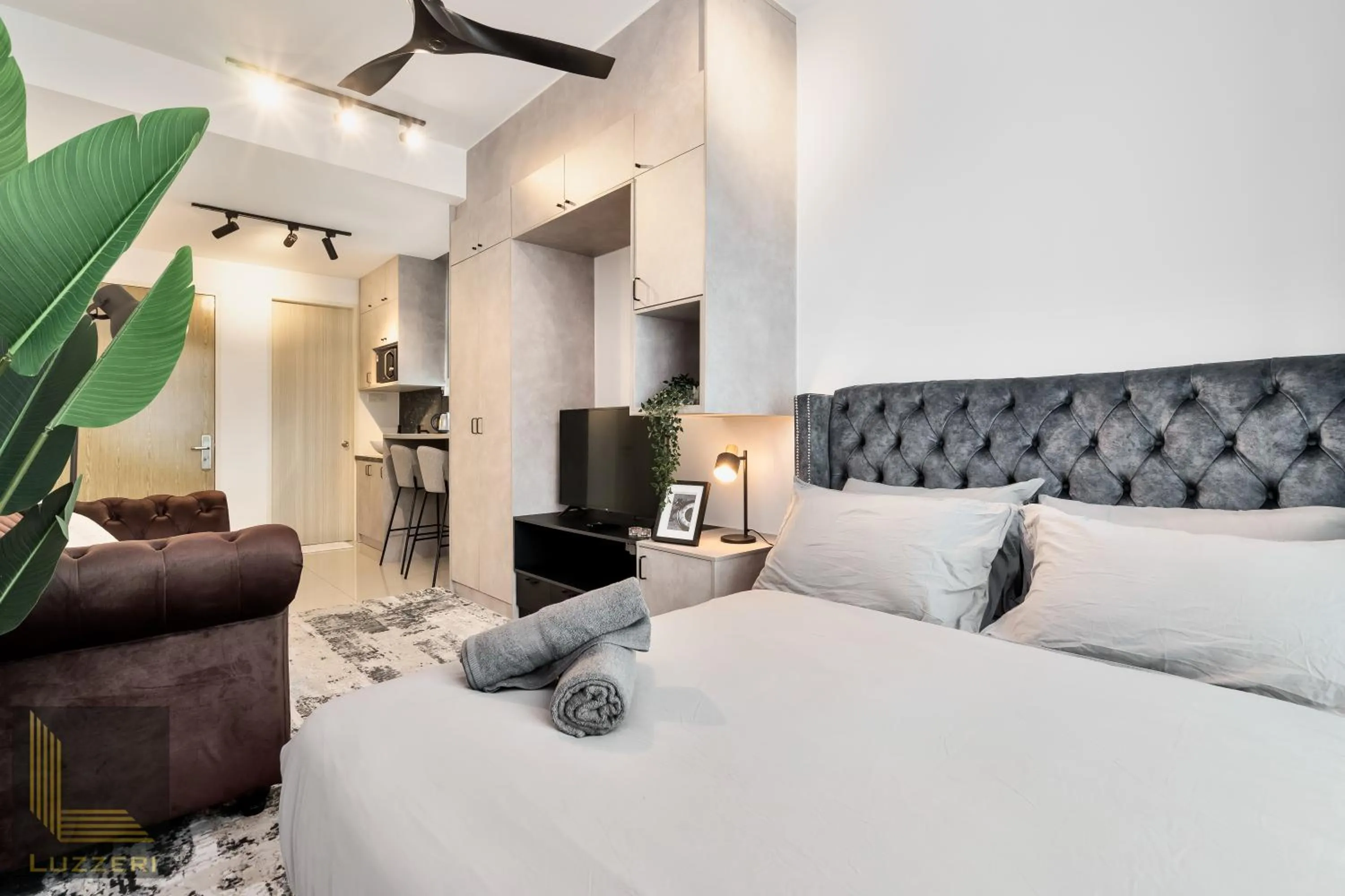 Living room, Bed in Legasi Kampung Baru Guesthouse