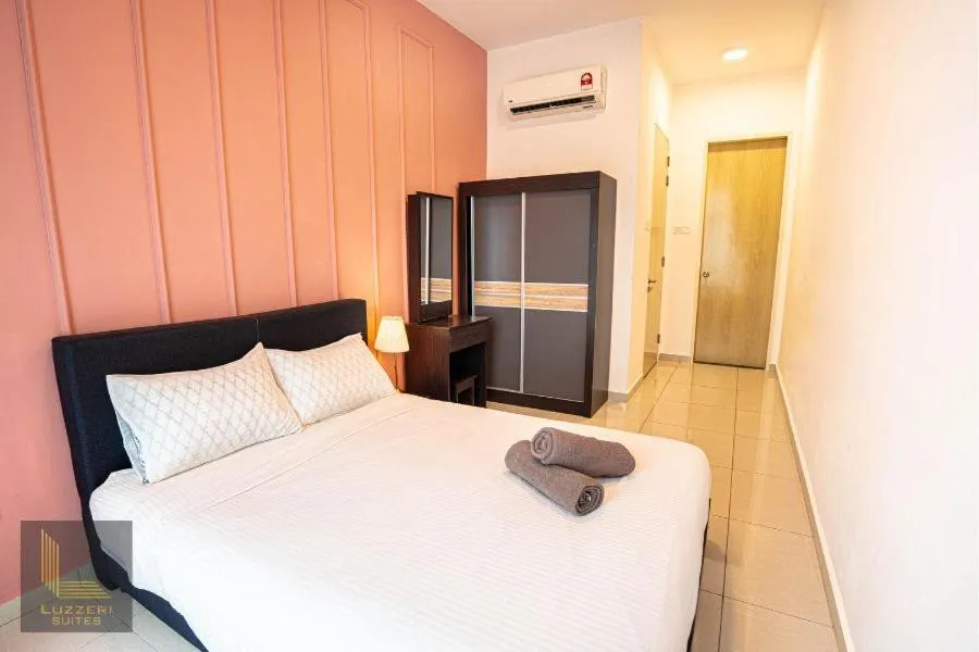 Bed in Legasi Kampung Baru Guesthouse