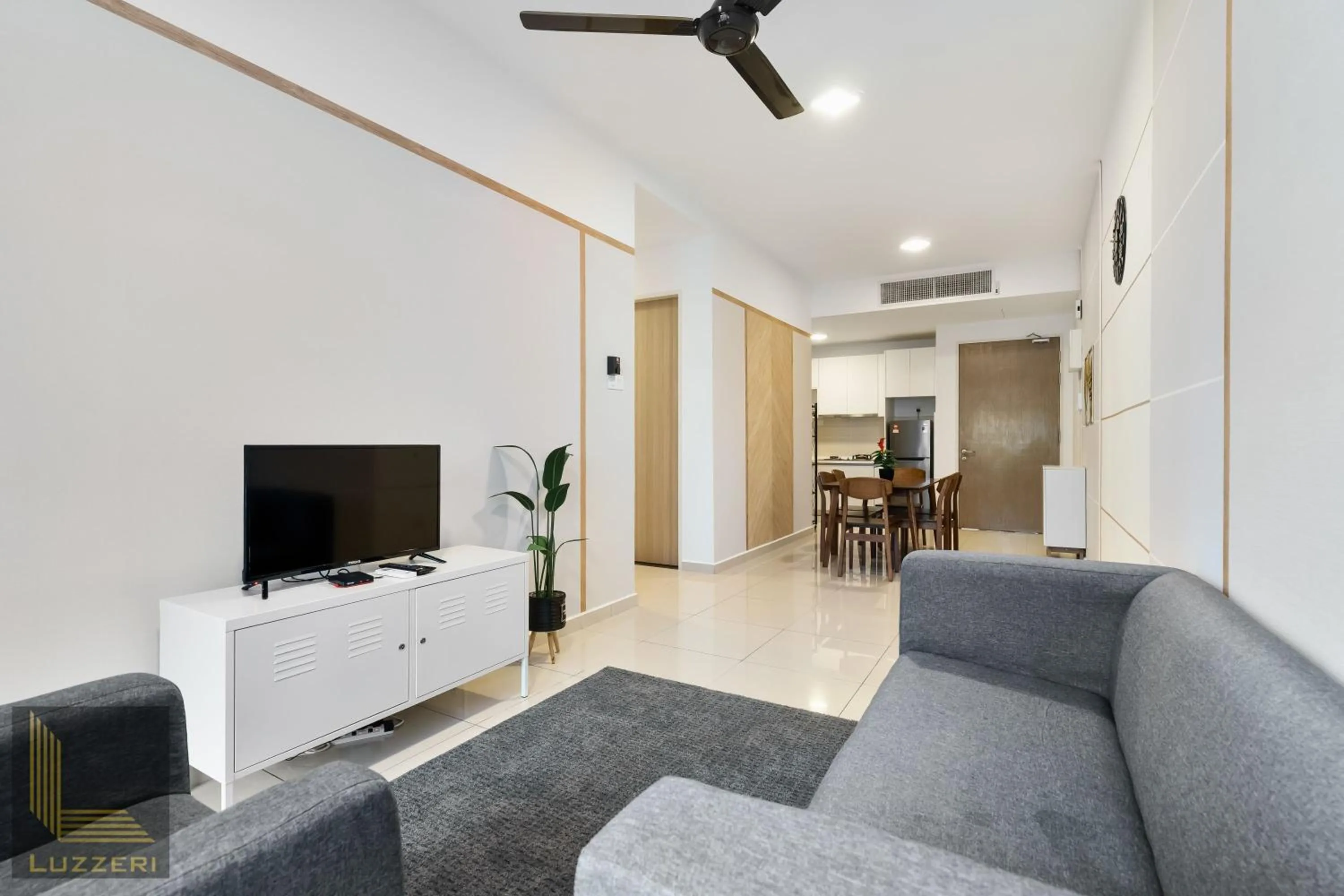 Communal lounge/ TV room in Legasi Kampung Baru Guesthouse