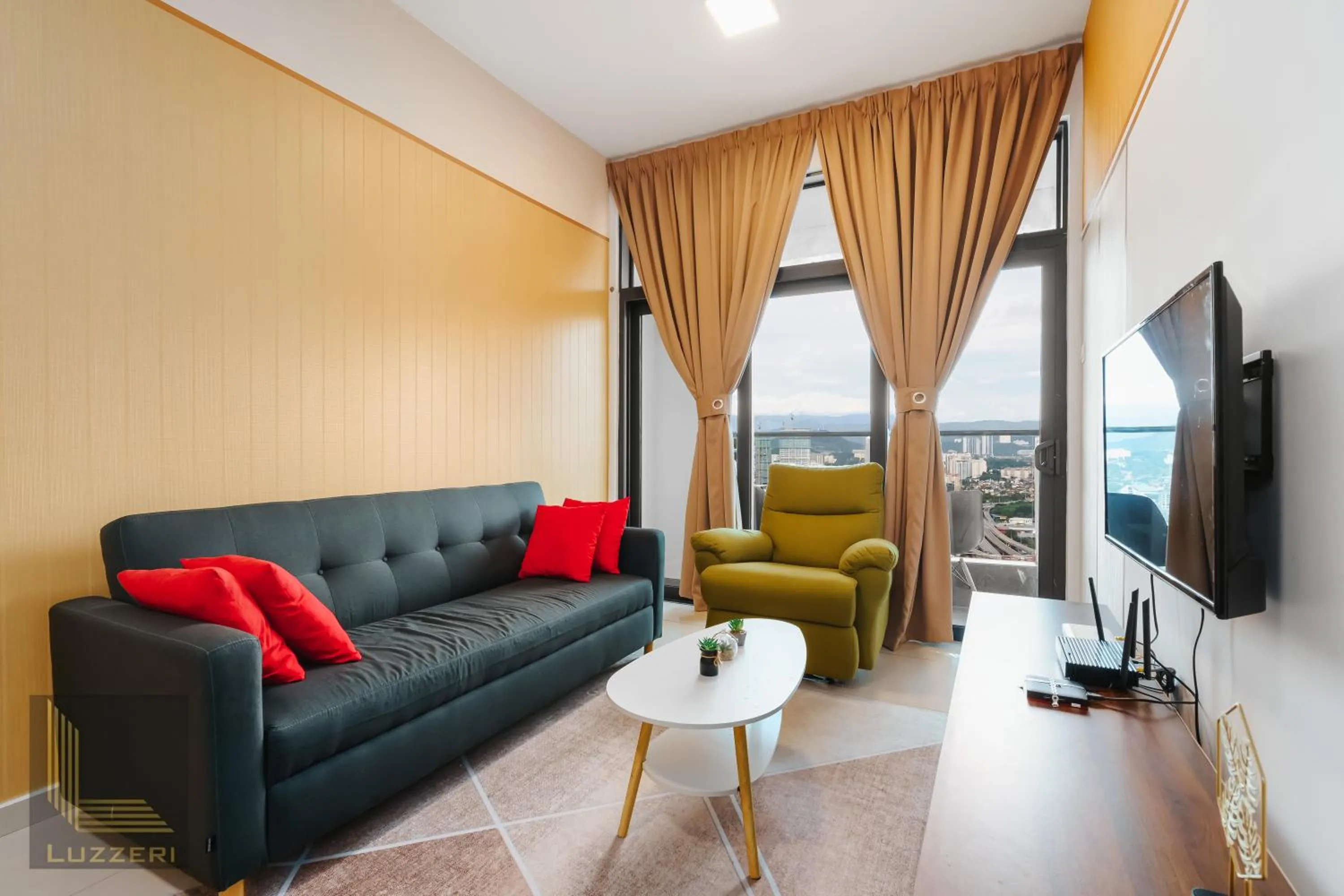 Communal lounge/ TV room in Legasi Kampung Baru Guesthouse