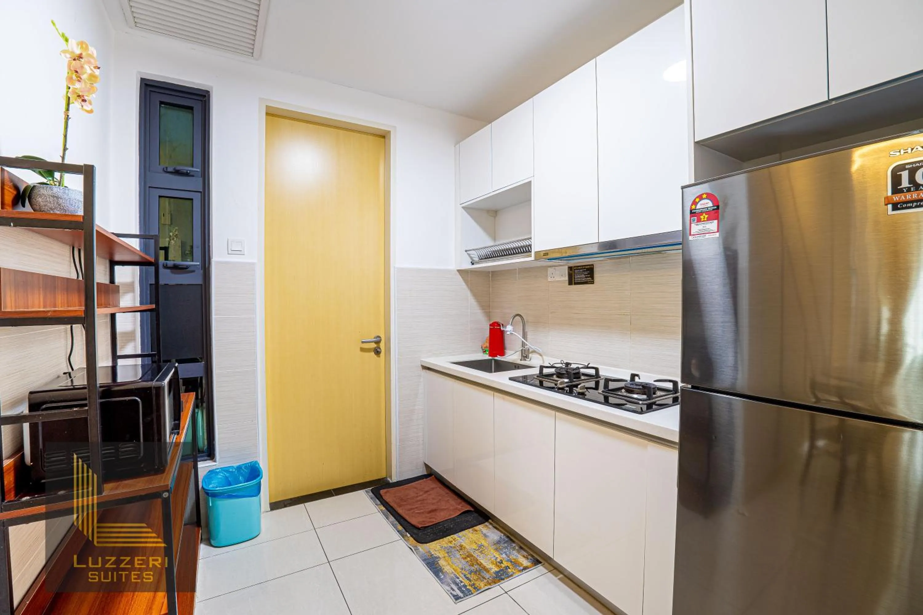 Kitchen or kitchenette in Legasi Kampung Baru Guesthouse
