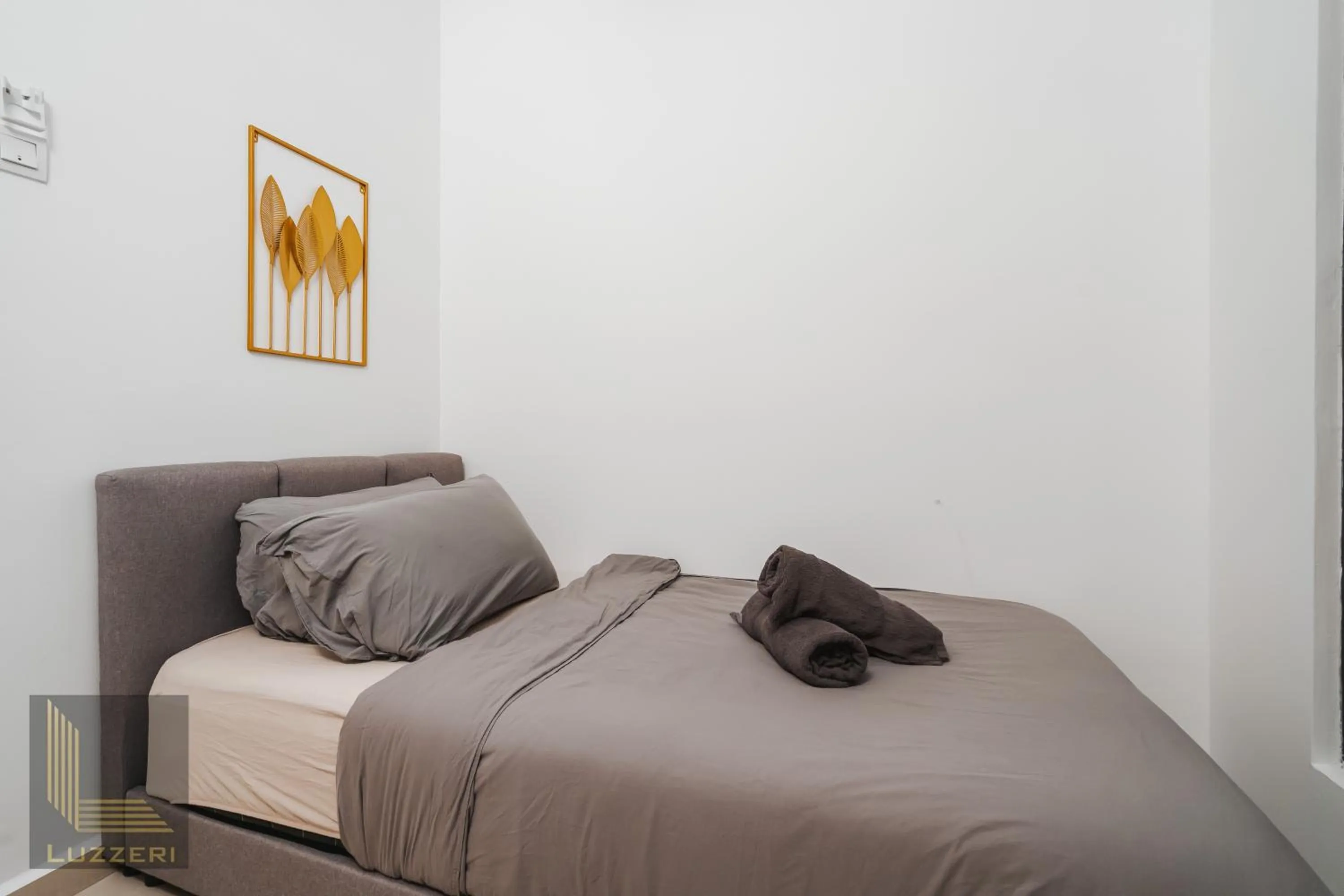 Bed in Legasi Kampung Baru Guesthouse