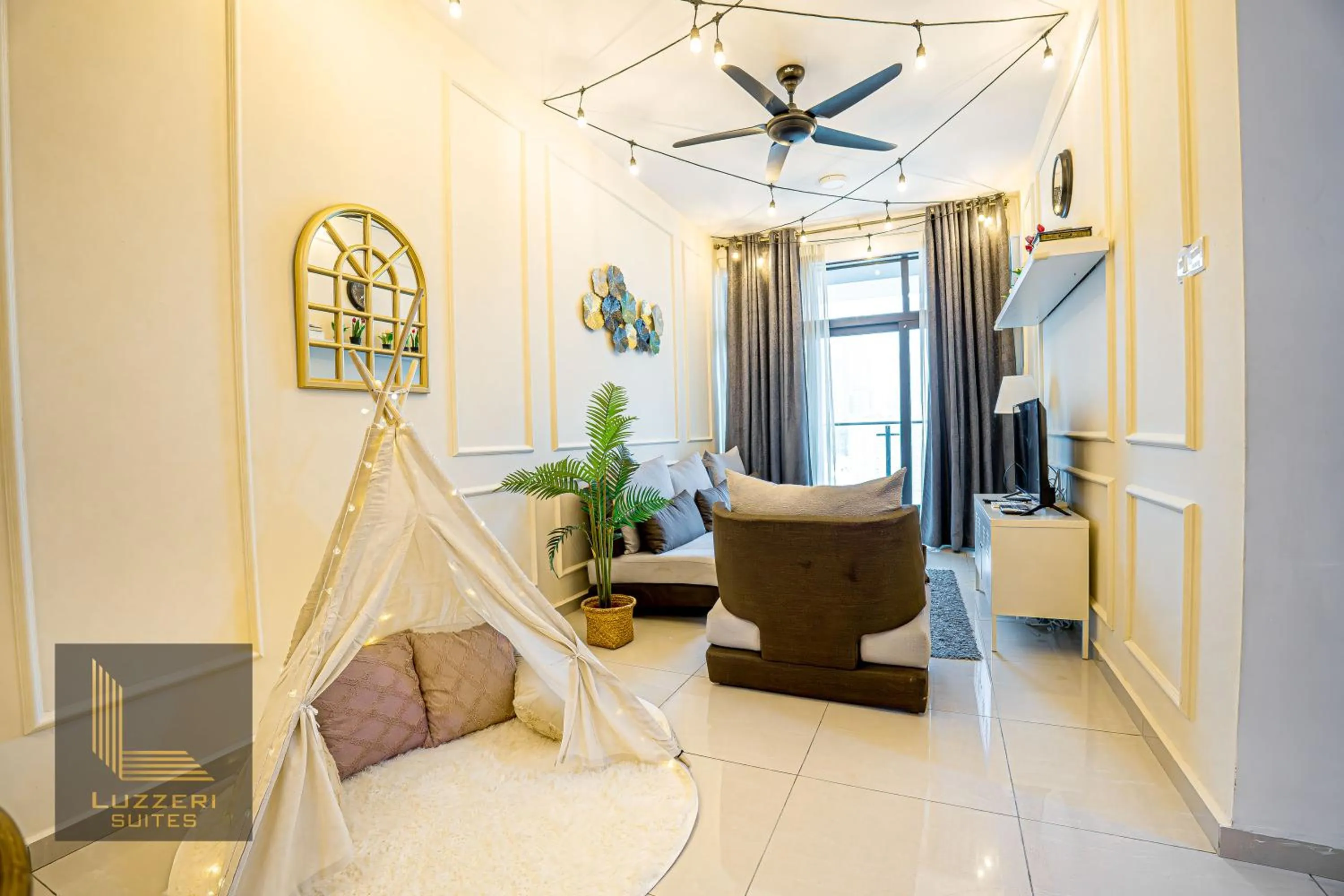 Living room in Legasi Kampung Baru Guesthouse