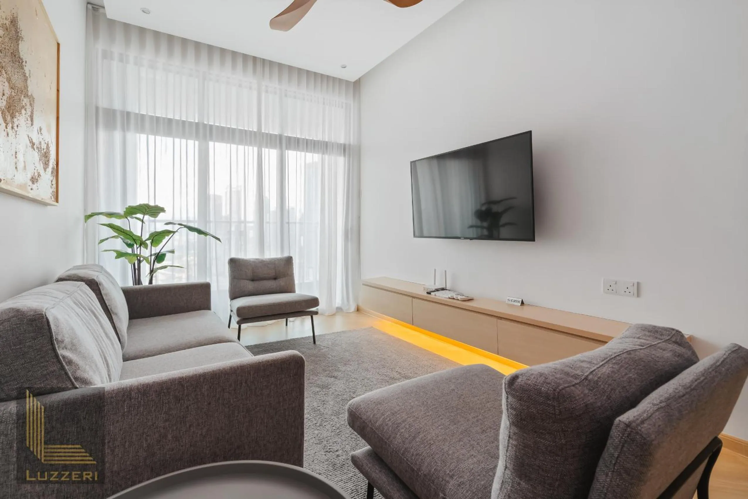 Living room in Legasi Kampung Baru Guesthouse