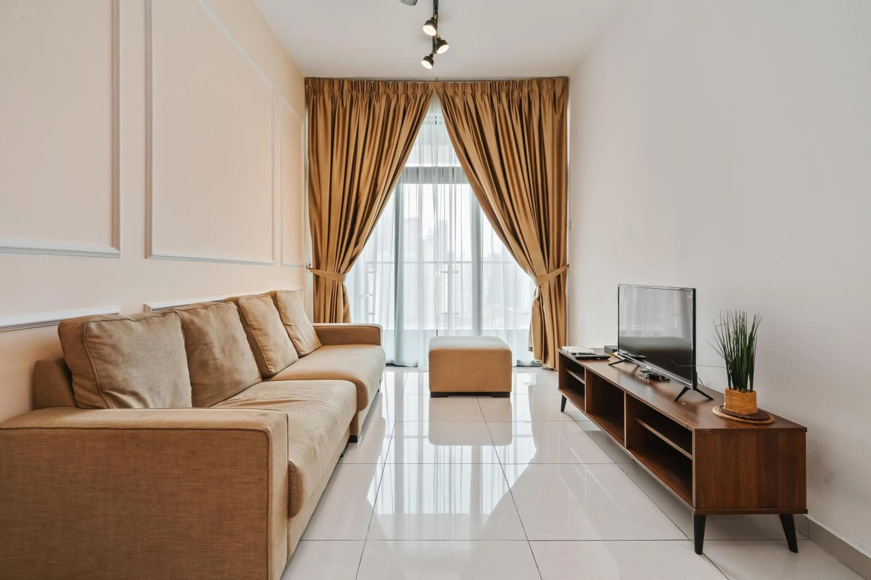 Living room in Legasi Kampung Baru Guesthouse
