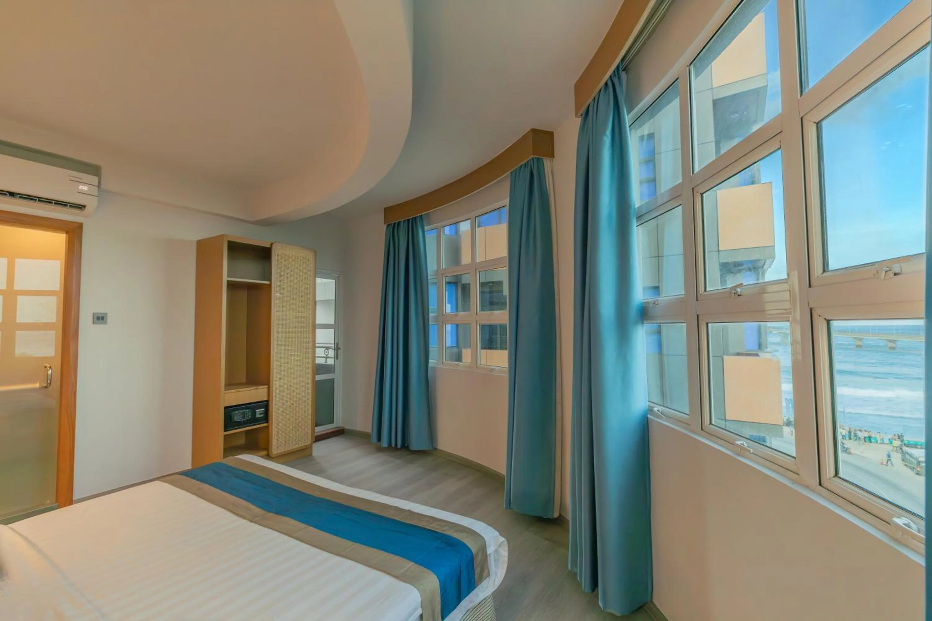 Photo of the whole room, Bed in UMET Seaview Hotel with Free Airport Pick up and Drop T&C Apply