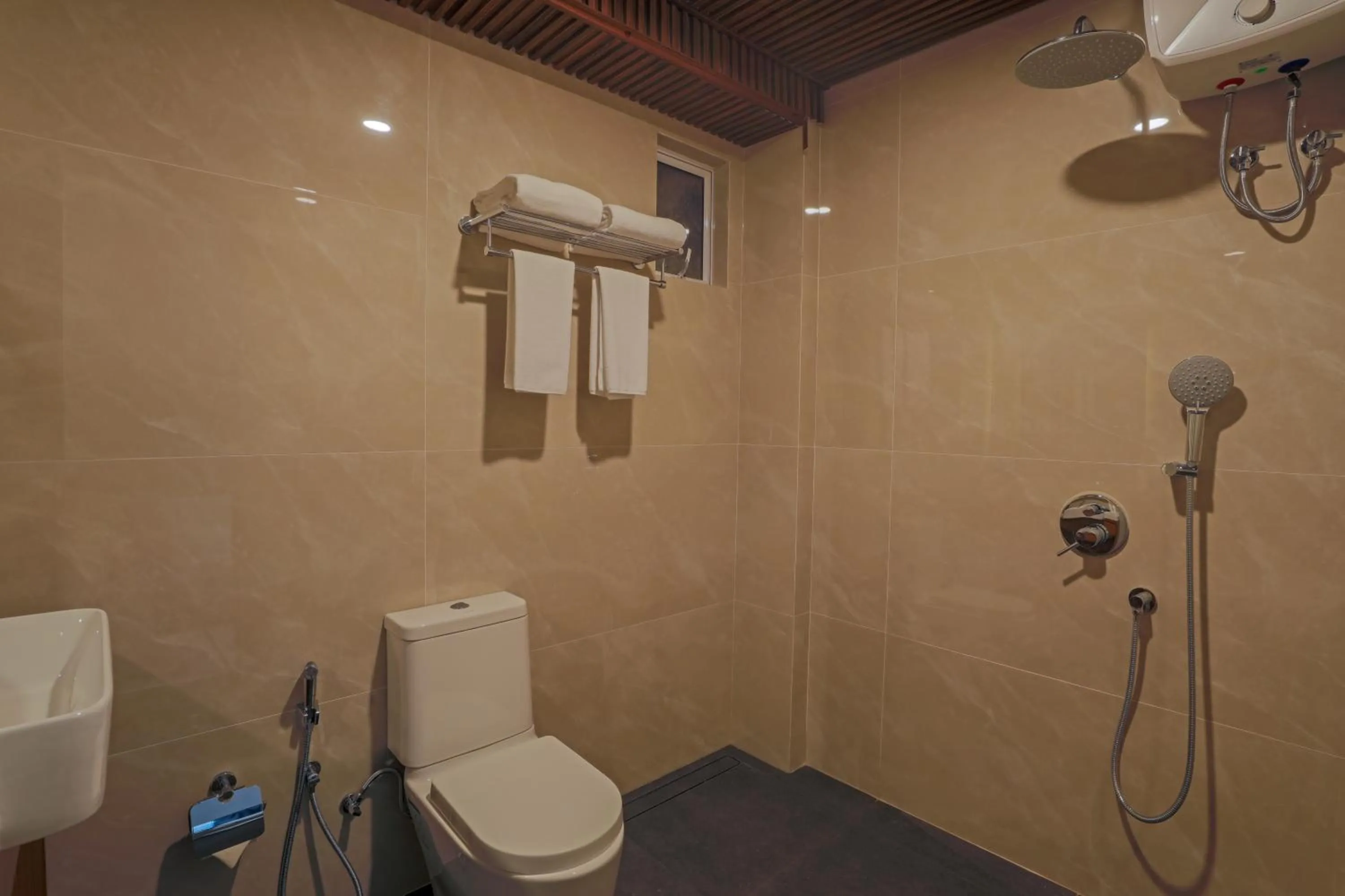 Bathroom in UMET Seaview Hotel with Free Airport Pick up and Drop T&C Apply