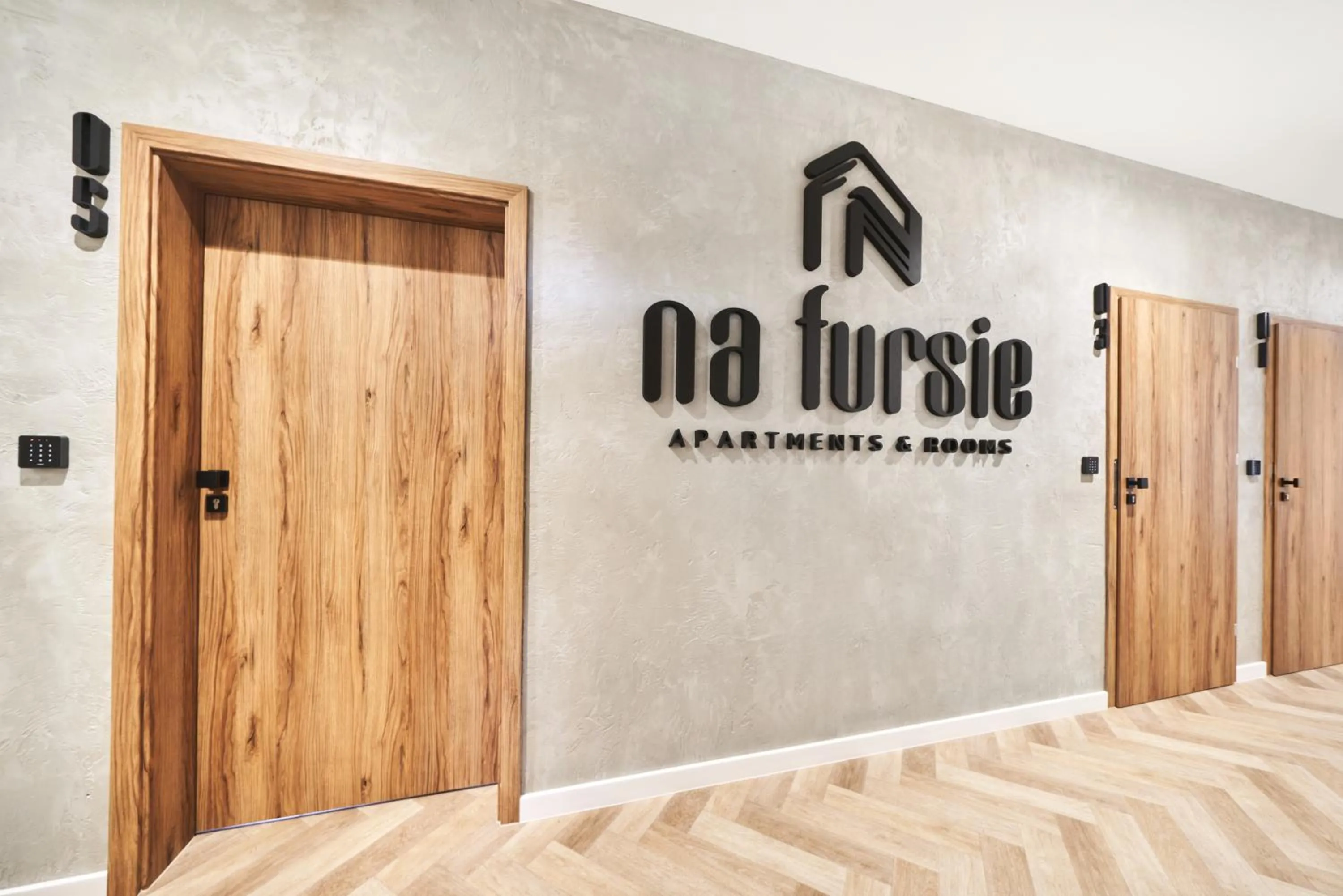 Property logo or sign in Na Fursie Apartments & Rooms