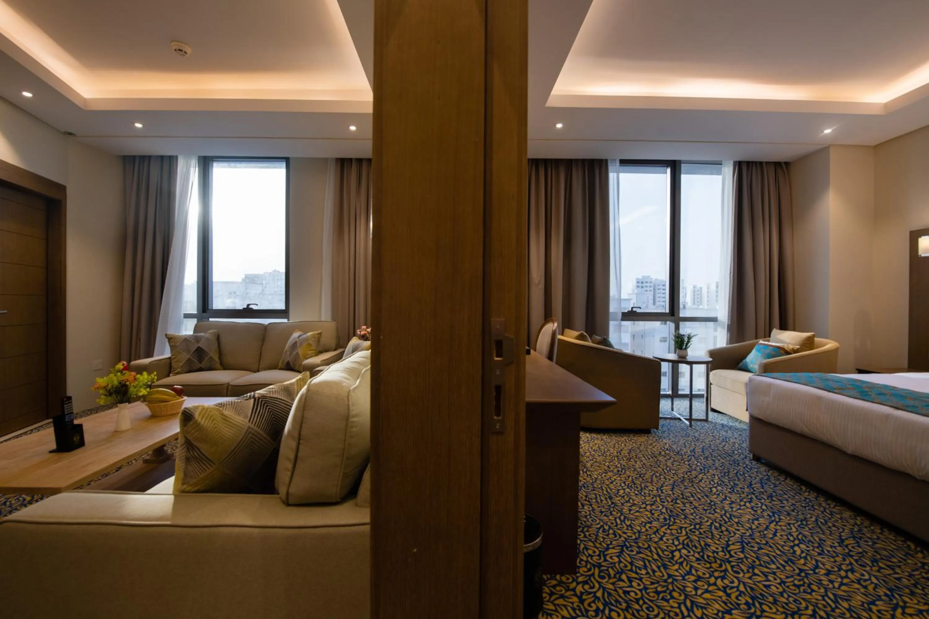 Living room, Bed in ROZANA HOTEL